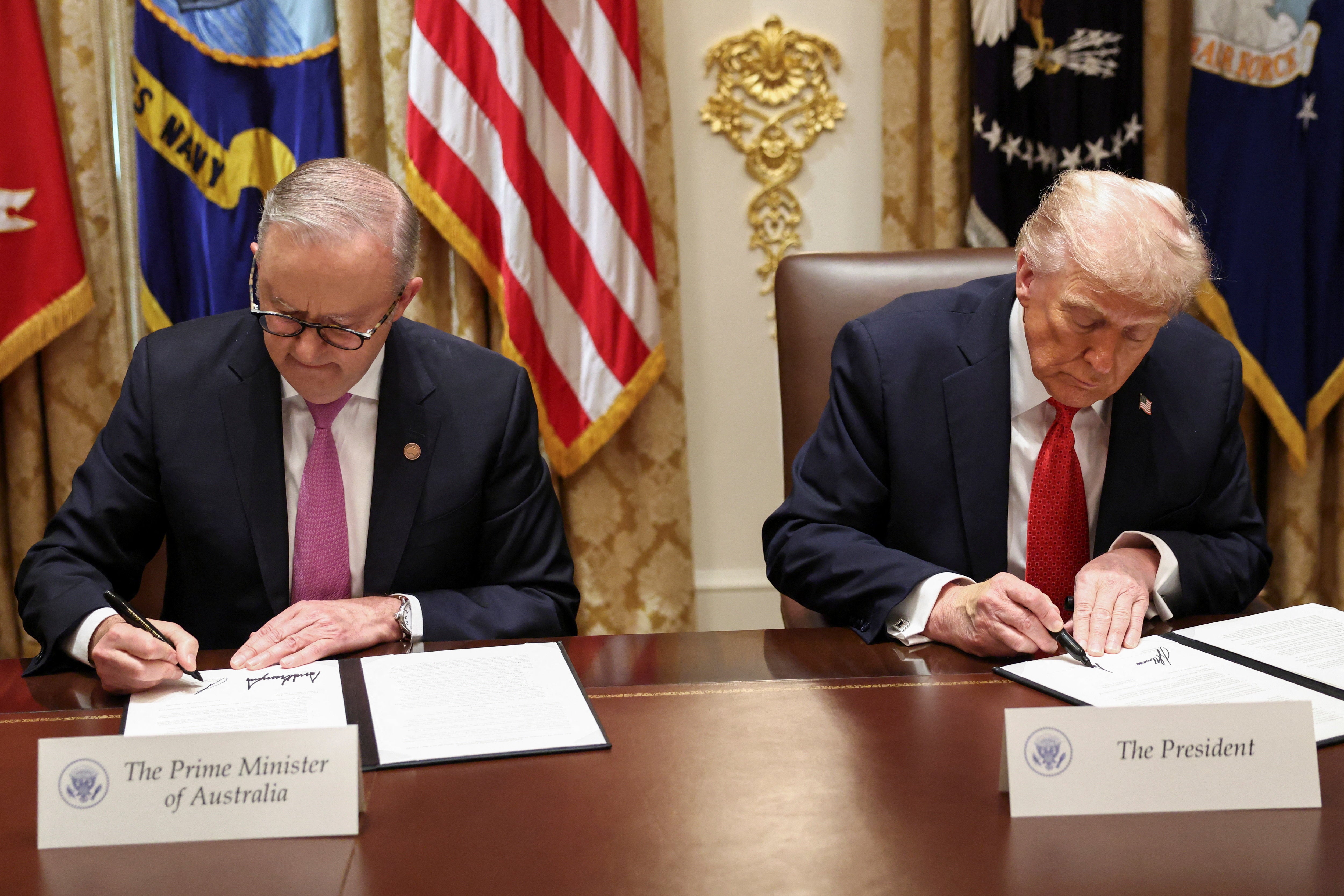 President Donald Trump and Australian Prime Minister Anthony Albanese sign an agreement on rare earth and critical minerals