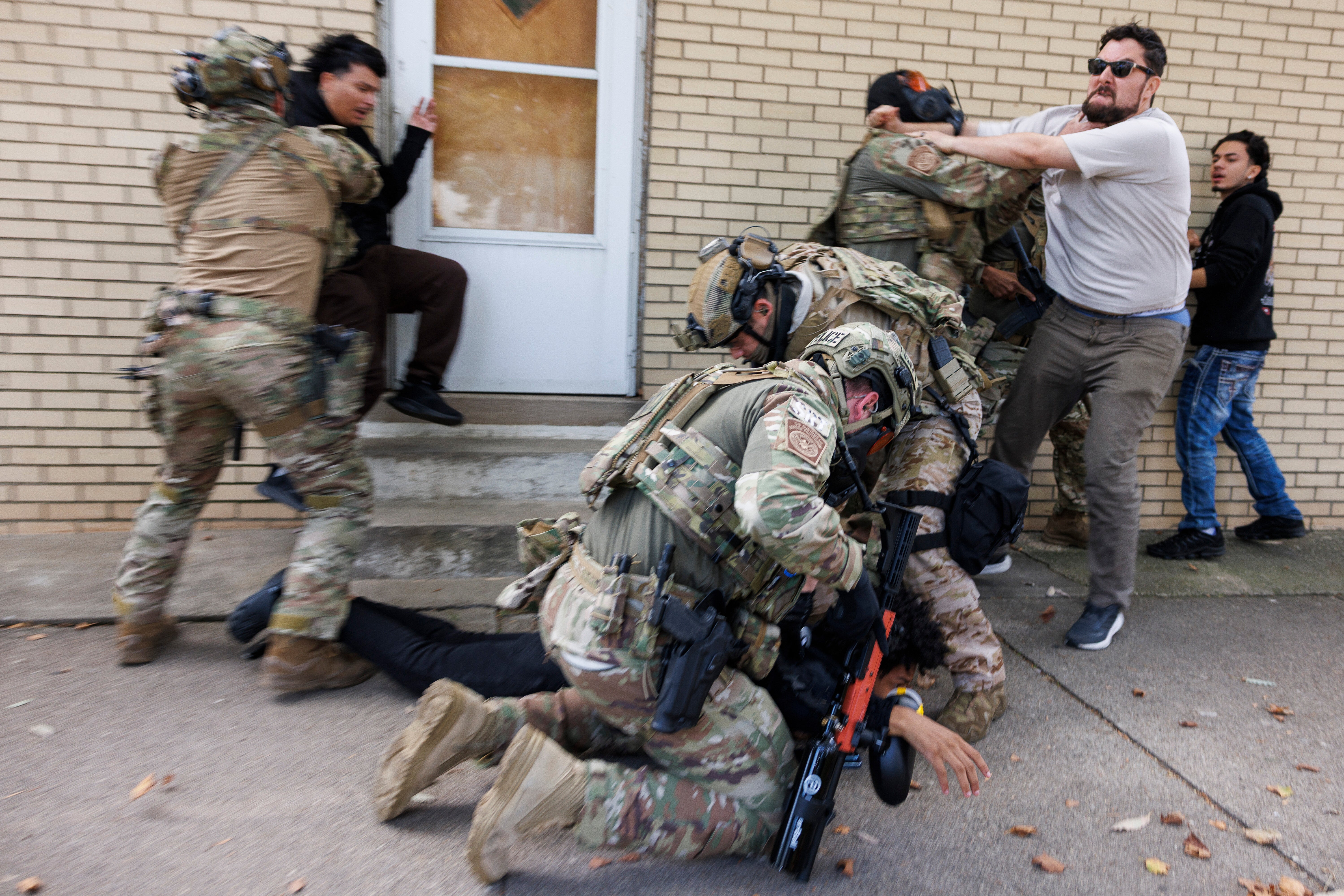 Federal immigration agents have been accused of abuses during the Illinois operation including firing riot control weapons on peaceful protesters and conducting an aggressive commando-style raid on an apartment building full of children