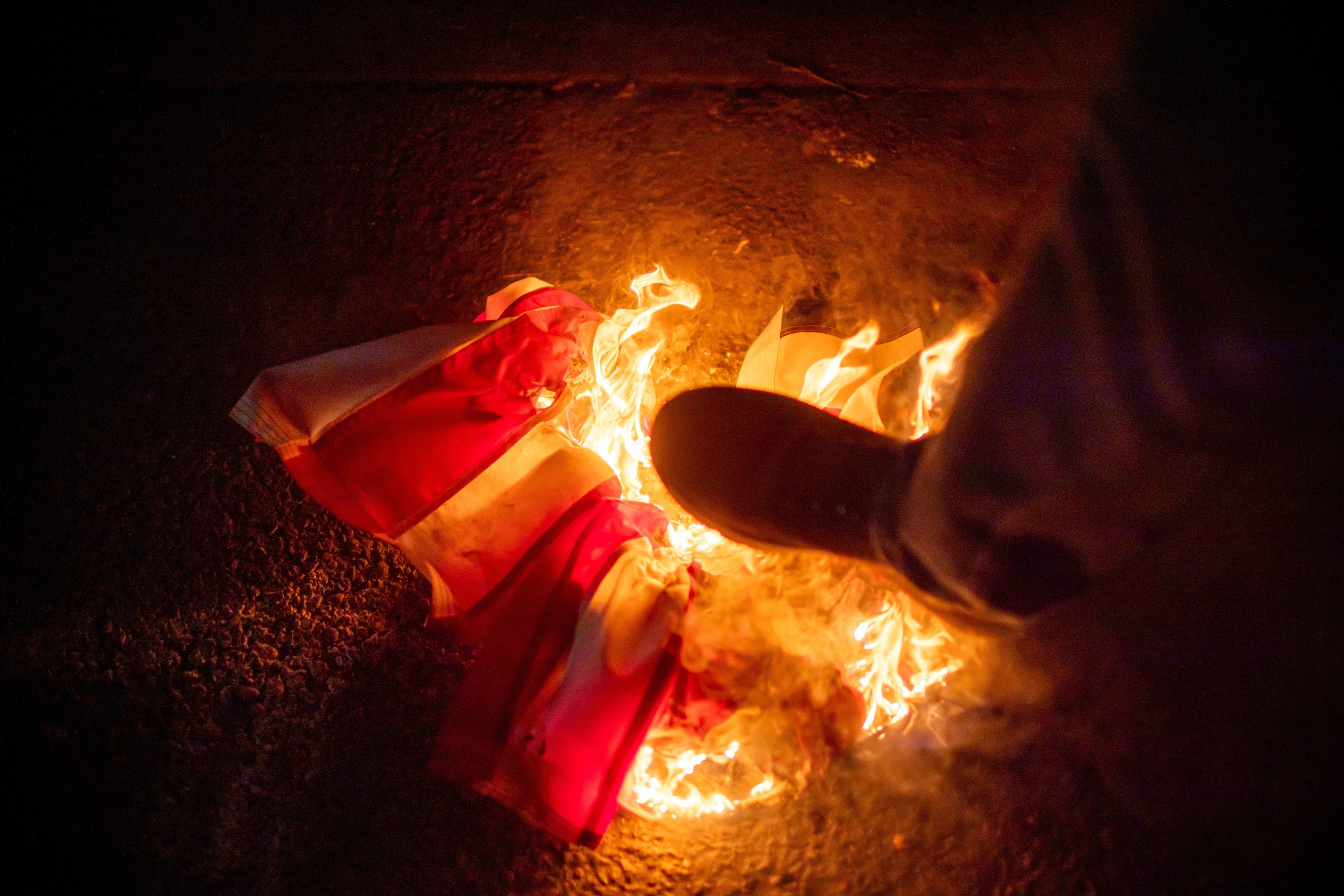 Among the more aggressive actions protesters have taken, is burning a flag – which is a form of protected speech in the US