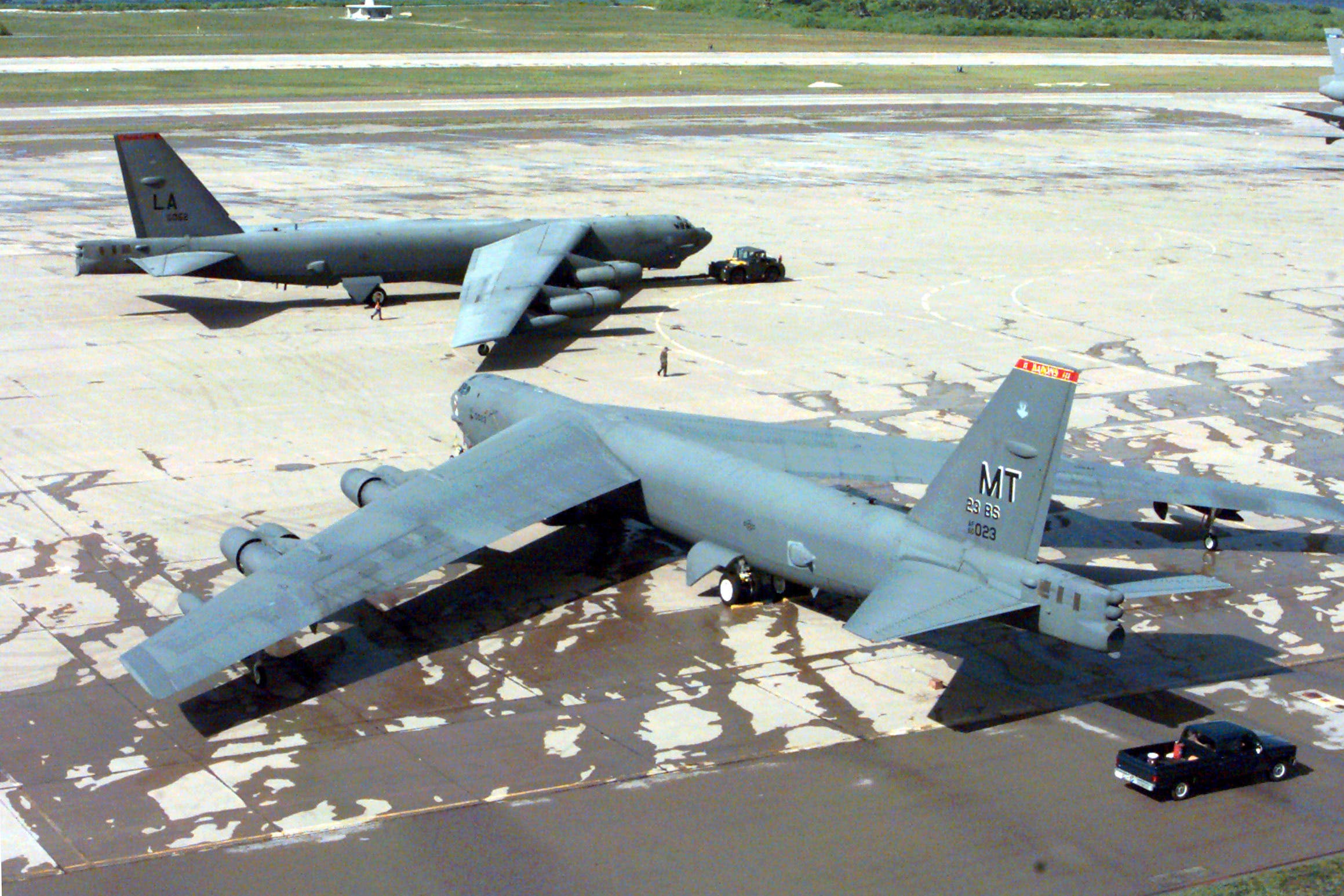 A US Air Force B-52H Stratofortress is towed past another on the flight line at Navy Support Facility Diego Garcia, British Indian Ocean Territory (US Department of Defence/PA)