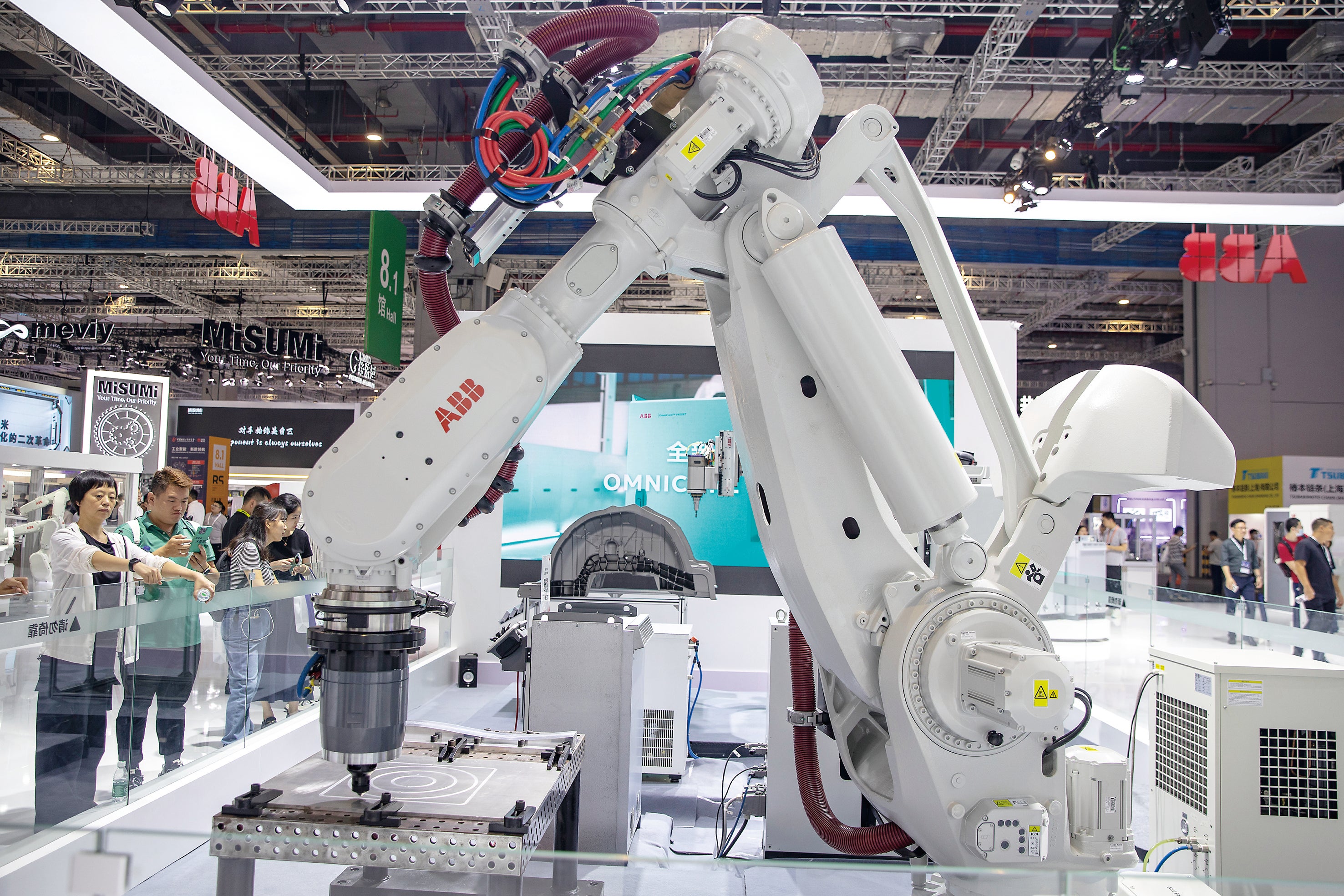 An industrial robot made by ABB on show during the China International Industry Fair in Shanghai on 25 September