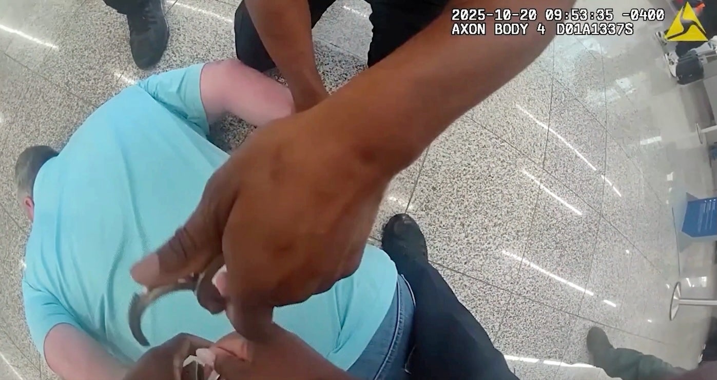 As the cops pinned Cagle to the ground and handcuffed him, he let out a wailing scream