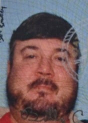 Billy Joe Cagle, 49, has been arrested with a semi-automatic weapon at Atlanta’s Hartsfield-Jackson International Airport after threatening to 'shoot it up,' according to police