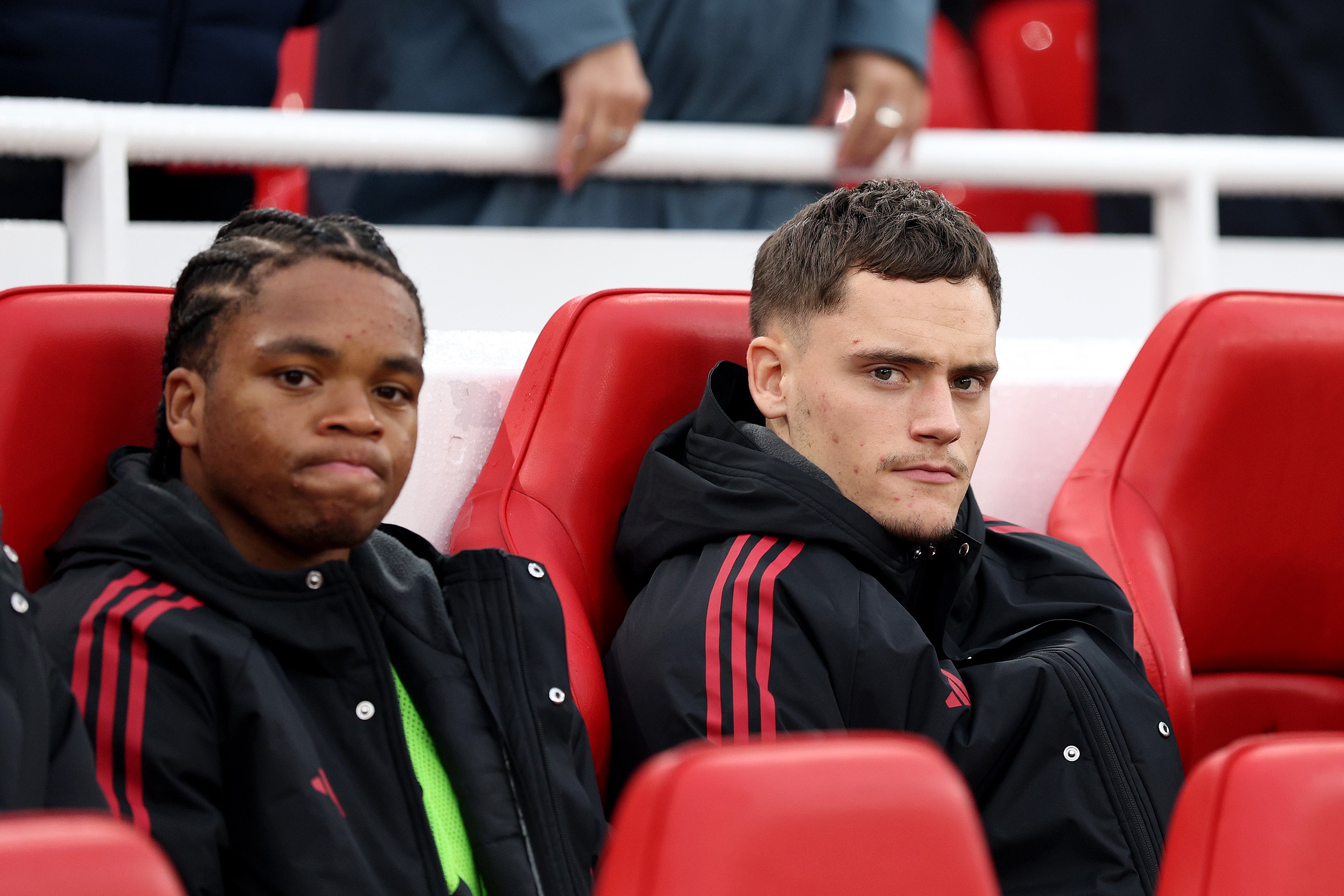 Florian Wirtz (right) started on the bench against Manchester United