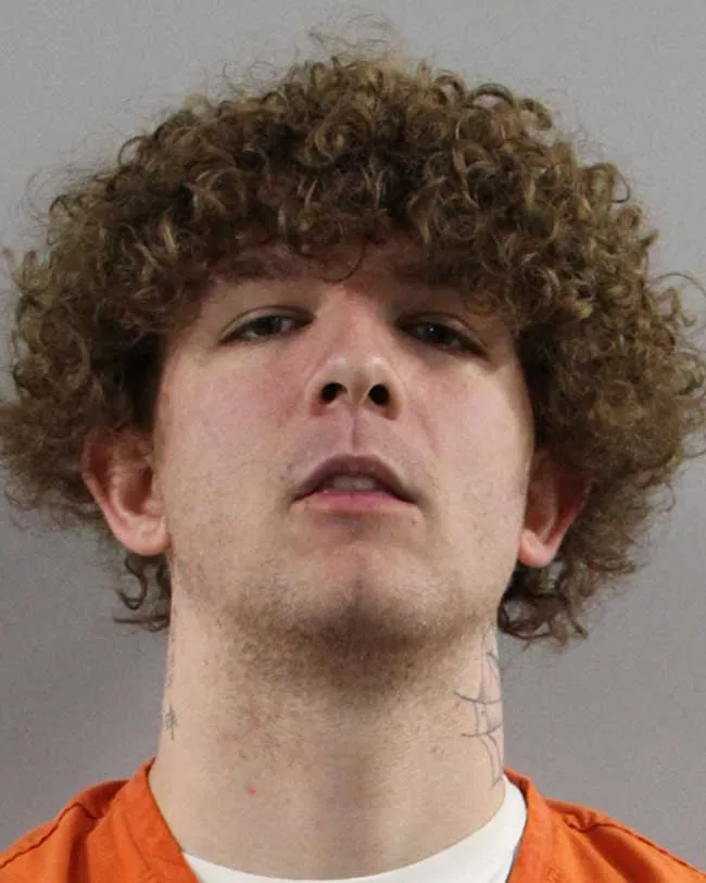 Nicholas Jones and Story were charged charged with trespass after warning and disorderly conduct