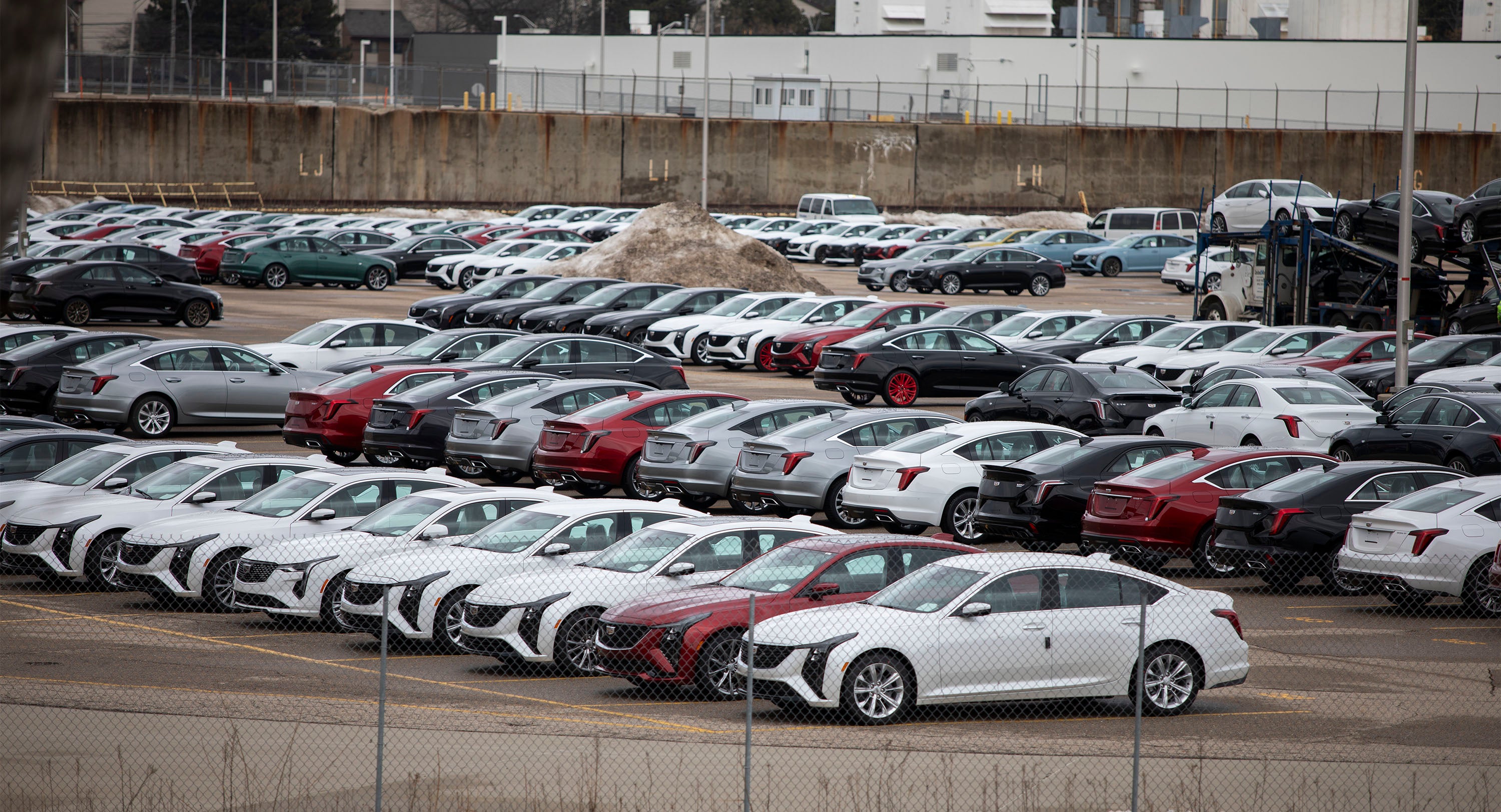 New General Motors vehicles parked at the GM Lansing Grand River Assembly plant as the first day of President Donald Trump's 25 percent tariffs on goods from Canada and Mexico went into effect on March 4, 2025