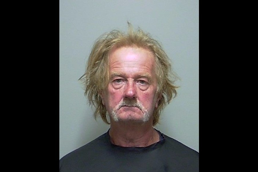 Minor Catledge was arrested after he threatened a neighbor with a knife and claimed she was trespassing with her dog on his property, cops say.