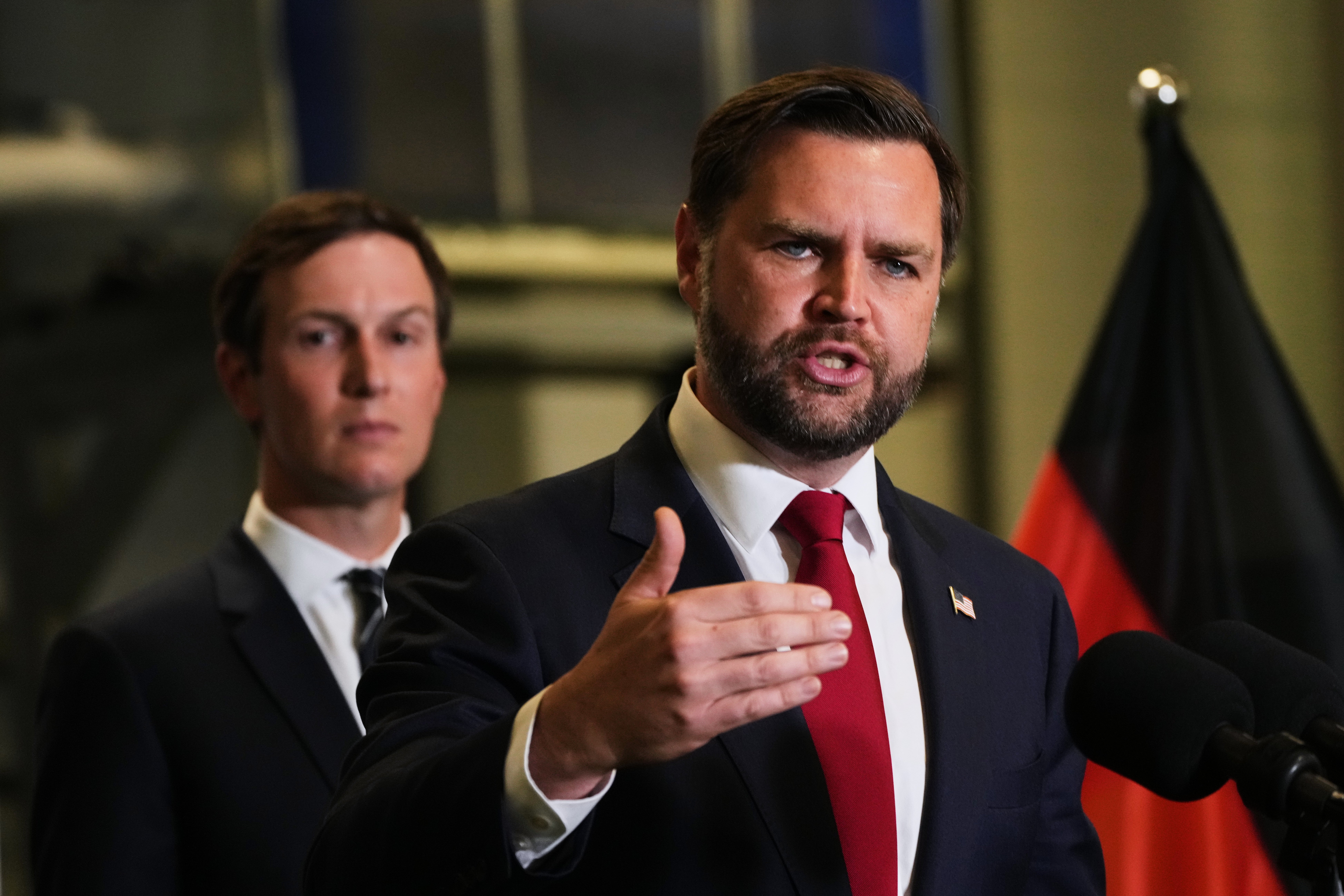 US vice-president JD Vance speaks to the media as Jared Kushner looks on, in Kiryat Gat, Israel, on Tuesday