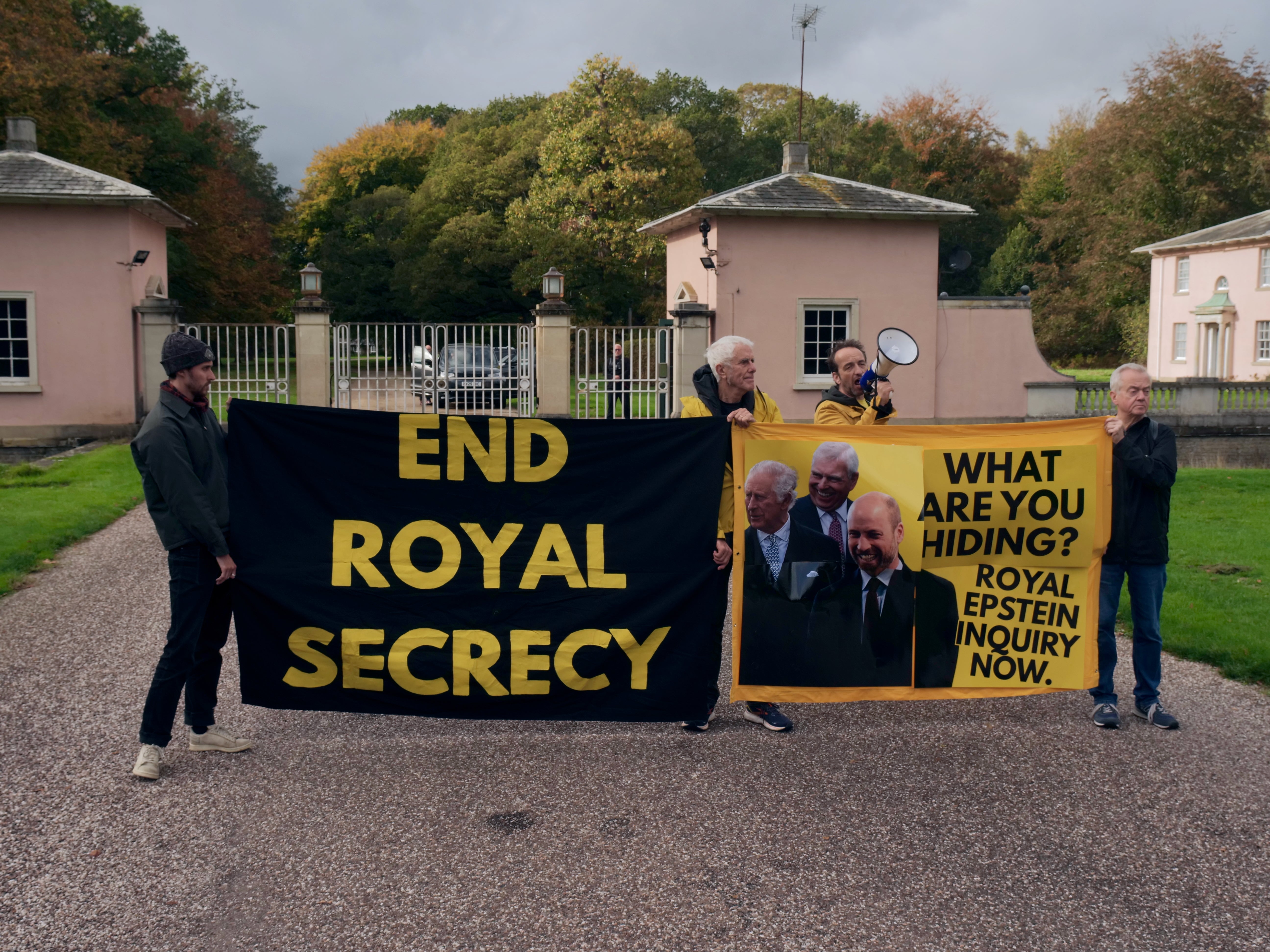 An 'Investigate The Royals' banner is unveiled outside Prince Andrew's residence by the Republic pressure group