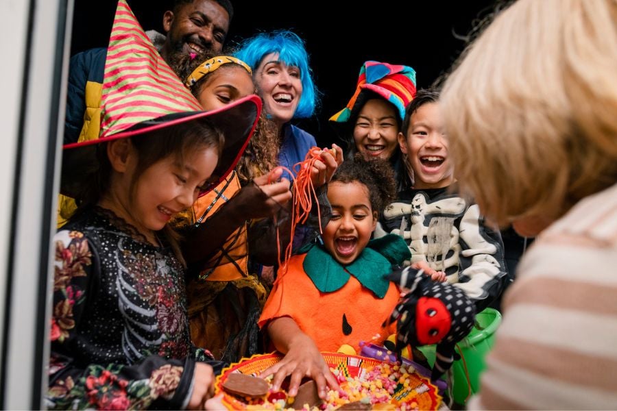 A social worker suggests parents set a limit on how much candy children can consume on Halloween
