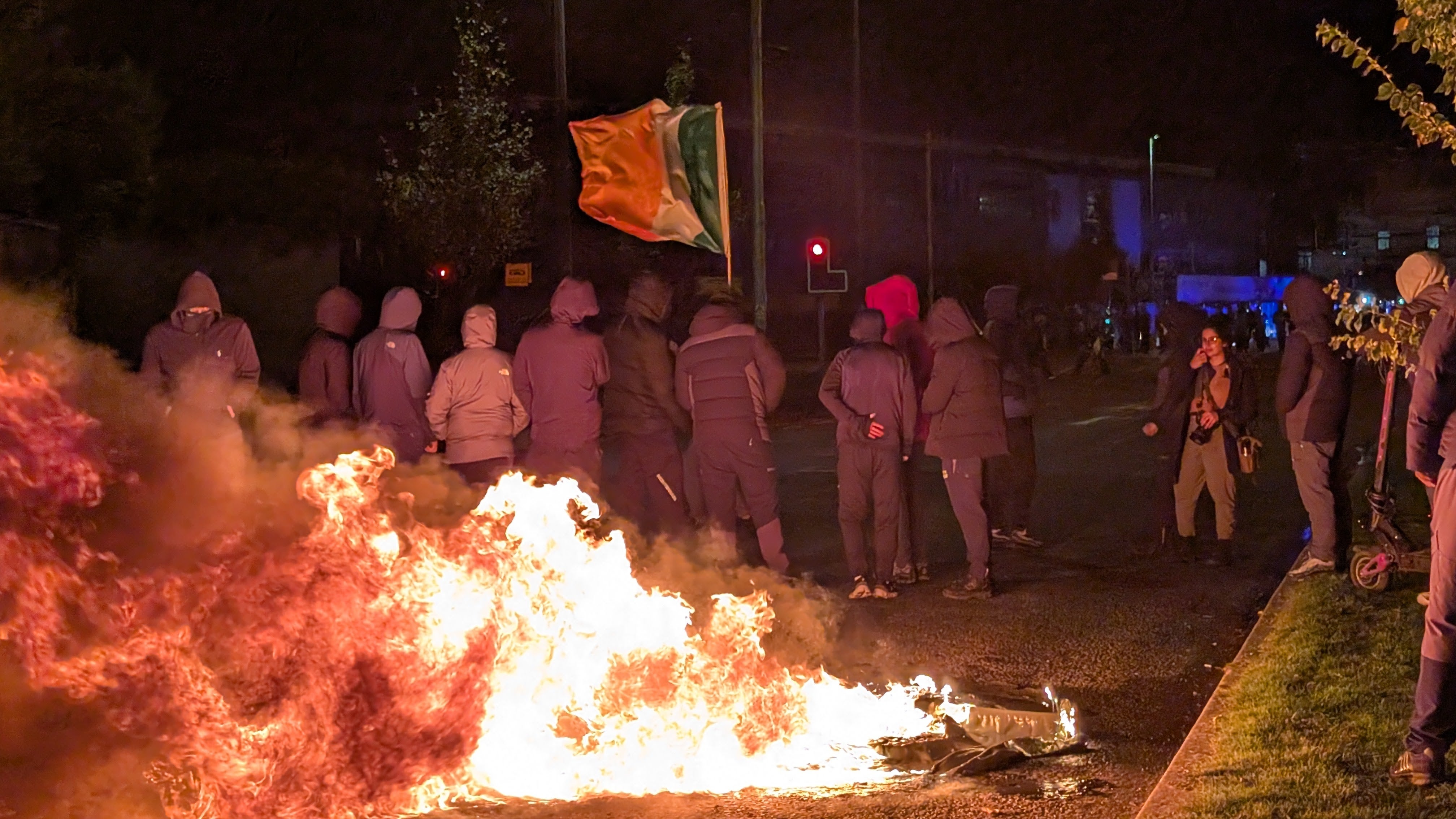 Individuals launched fireworks at gardai outside of a Dublin hotel on Tuesday night
