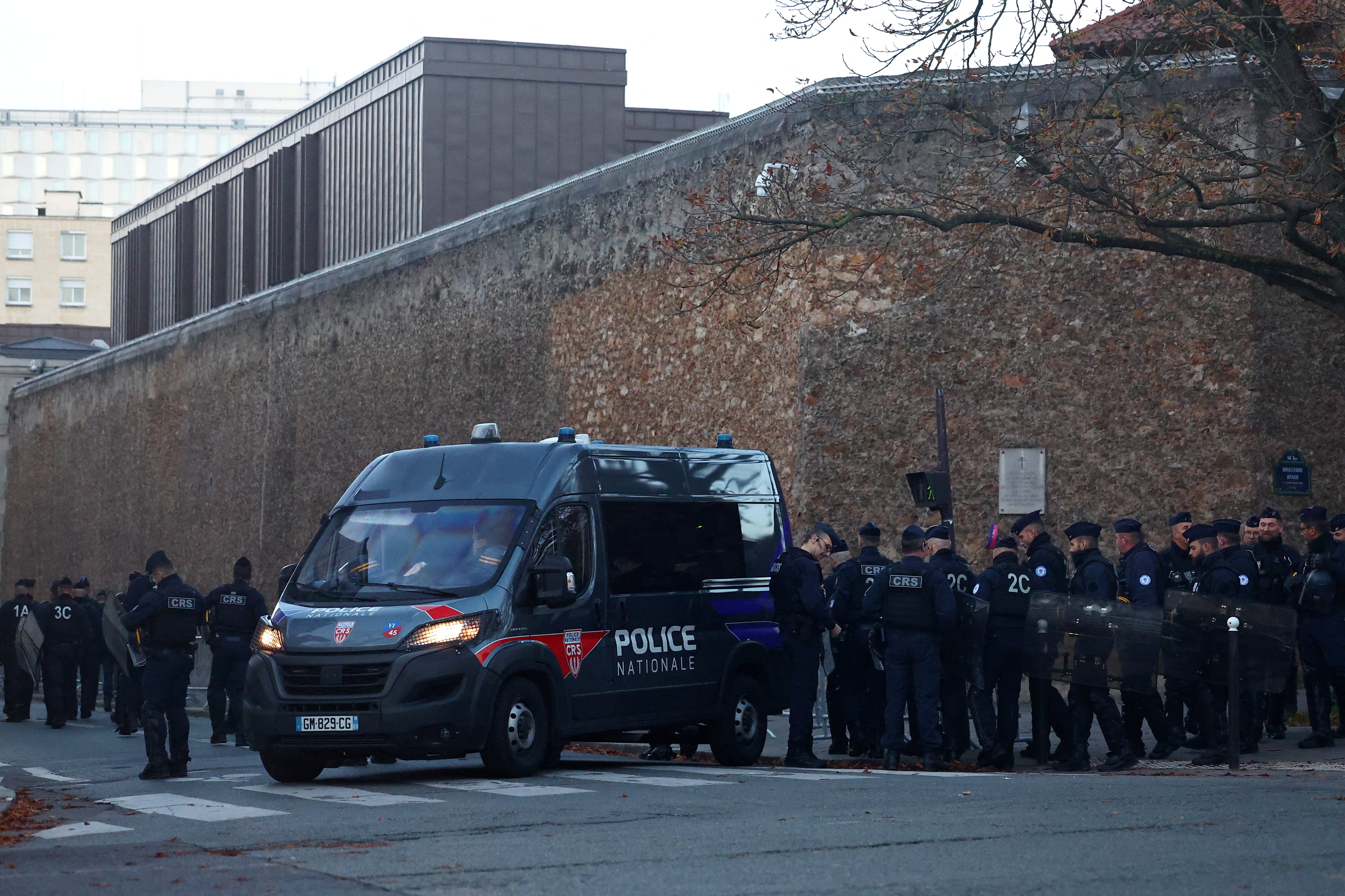 French police secure the area near La Sante prison