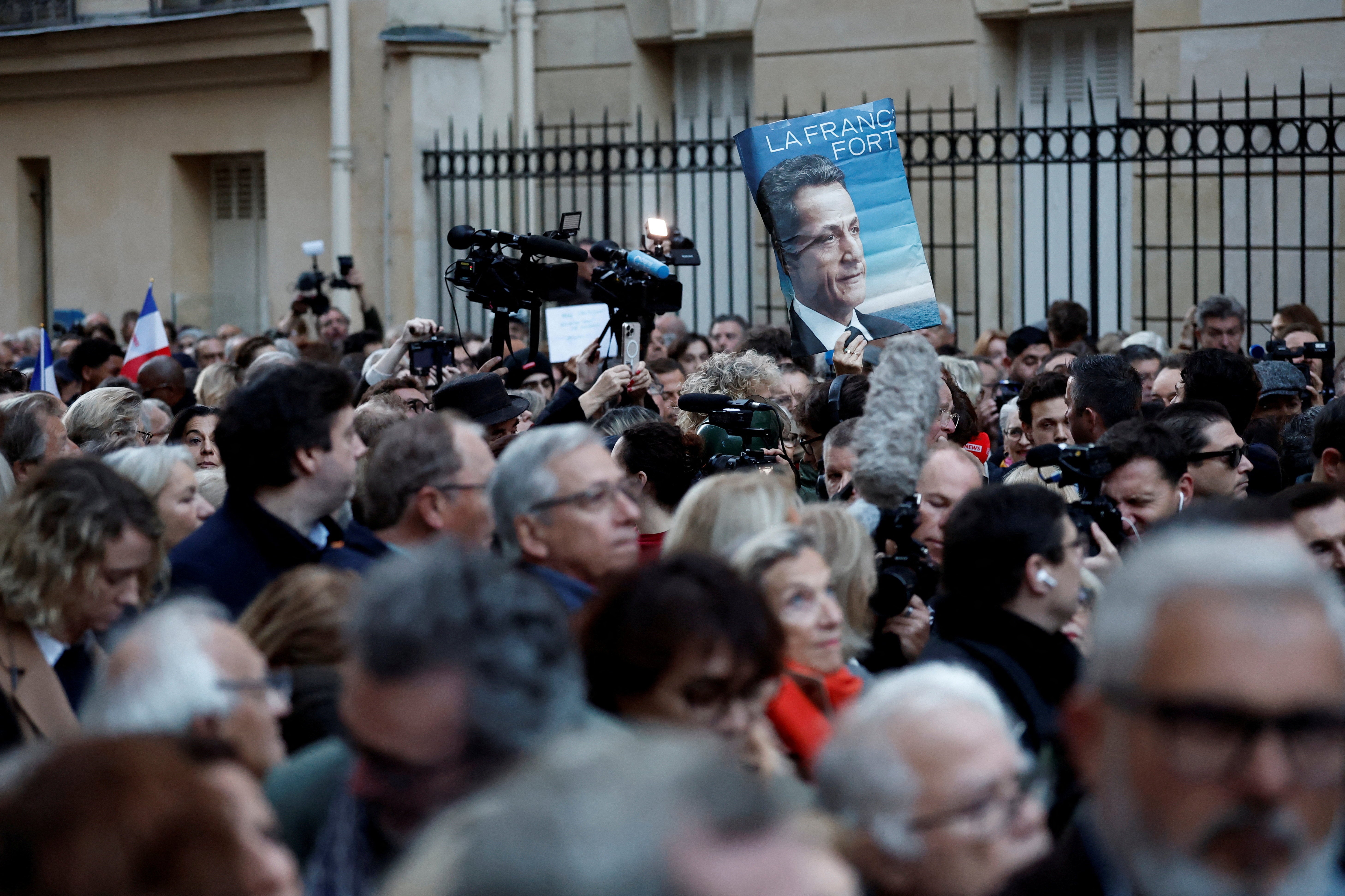A supporter of Nicolas Sarkozy pictured at a protest
