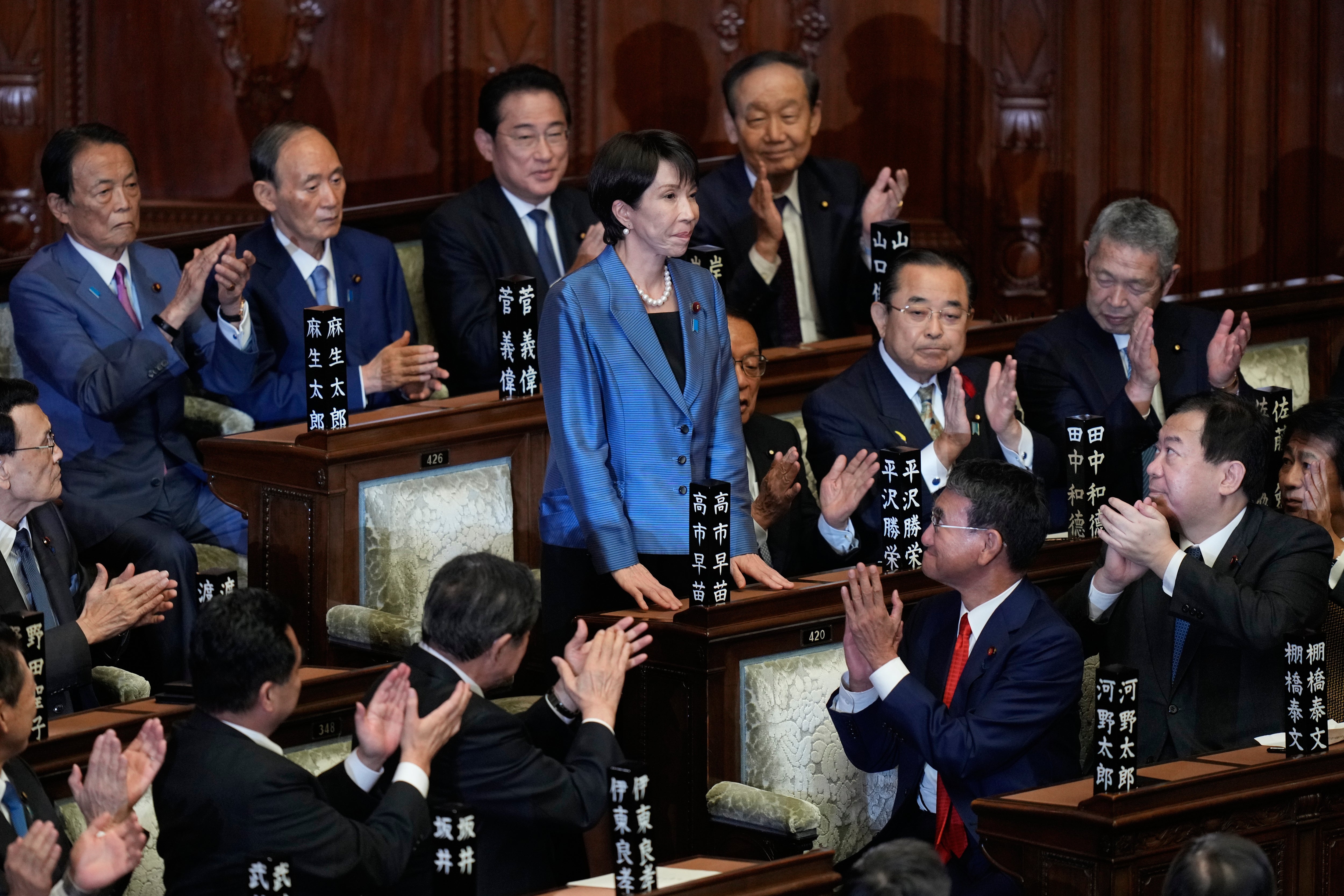 <p>Lawmakers applaud as Sanae Takaichi, centre, was elected Japan’s new prime minister during the extraordinary session of the lower house, in Tokyo, Japan, Tuesday, 21 October 2025</p>