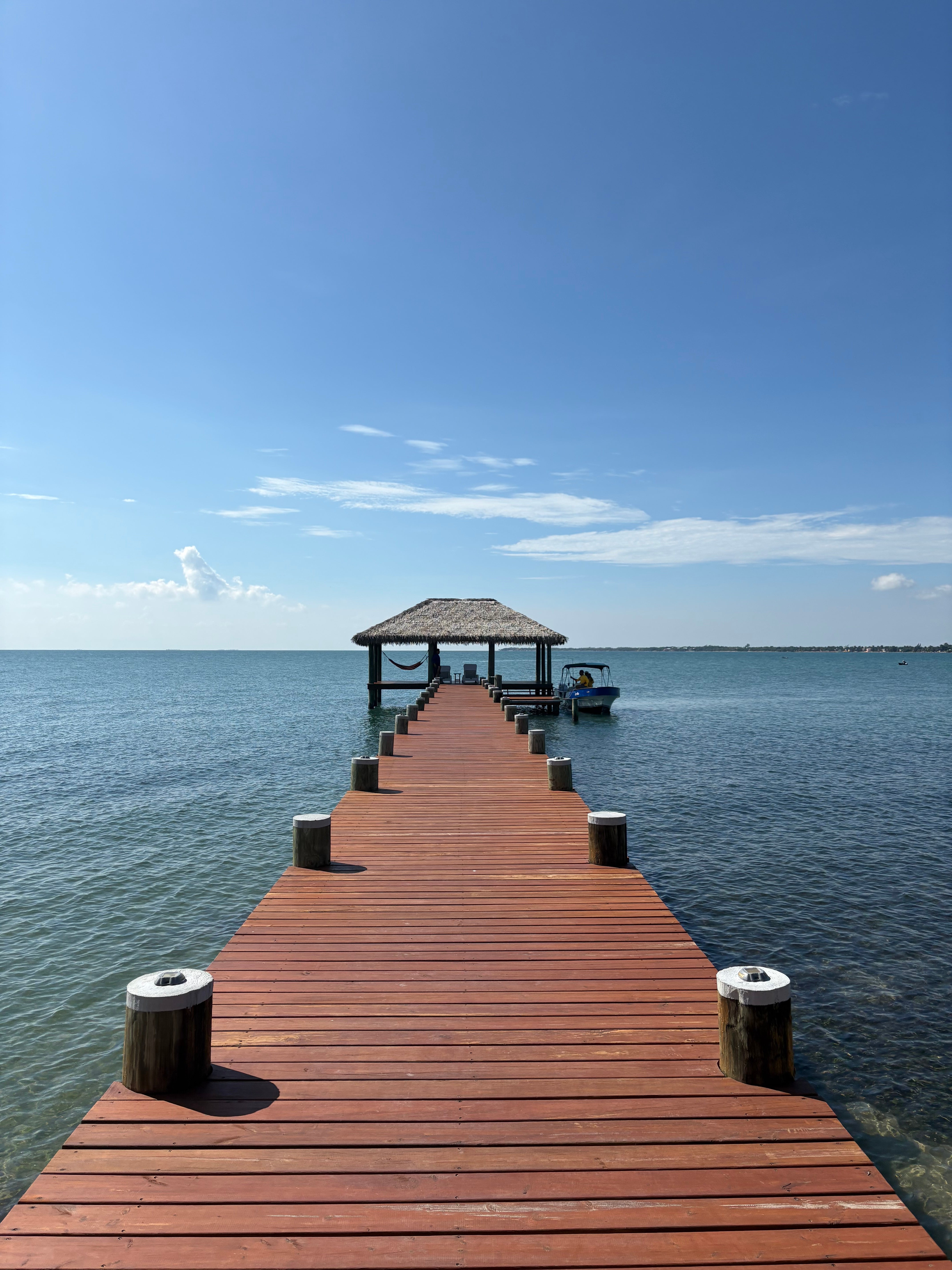 The dock in Belize where you get a boat to snorkelling heaven Moho Caye