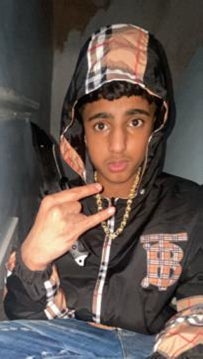 Handout image issued by South Yorkshire Police of Mohammed Umar Khan, 15, holding the weapon used to kill fellow pupil Harvey Willgoose, who he stabbed to death during a school lunch break