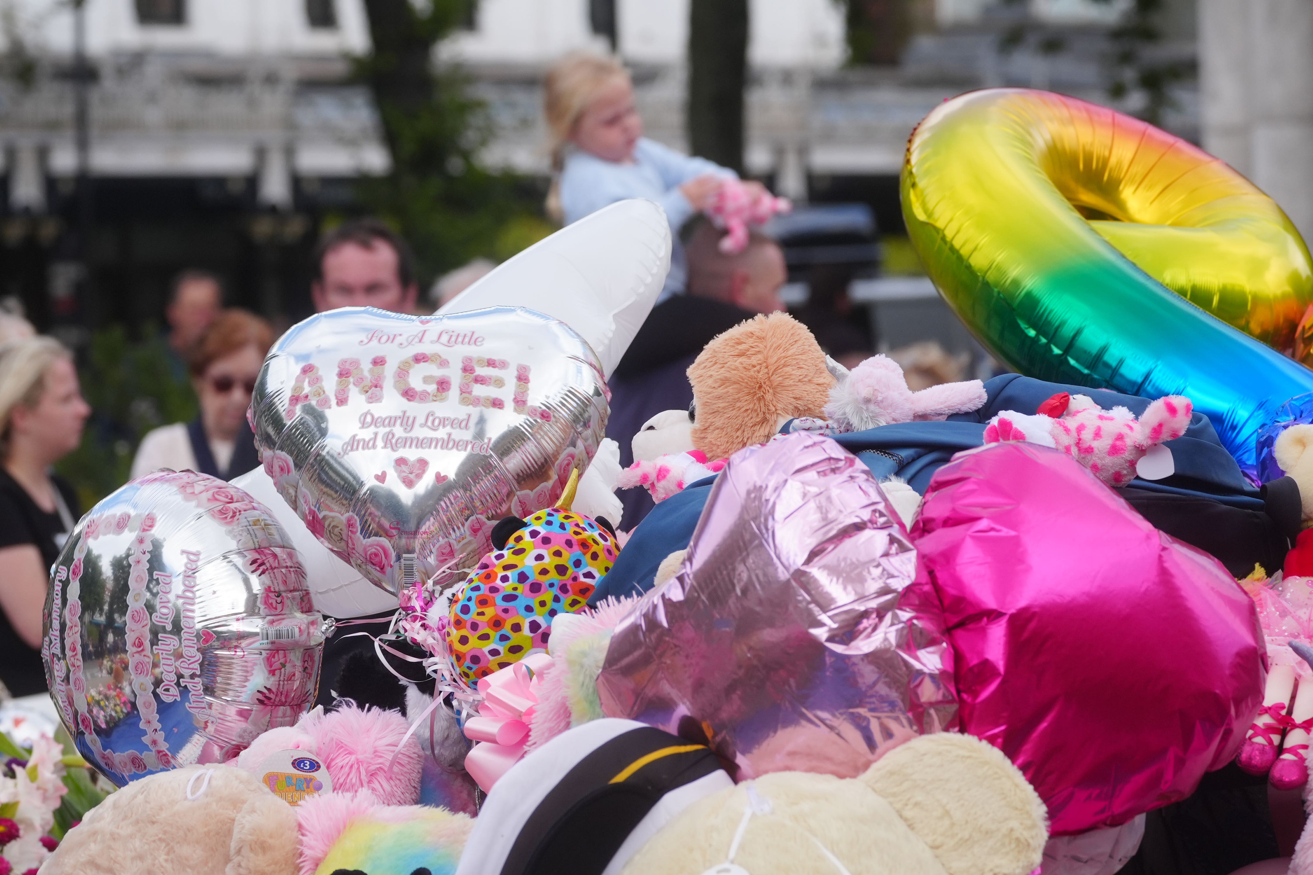 Flowers and tributes outside the Atkinson Art Centre Southport after the attack (Owen Humphreys/PA)