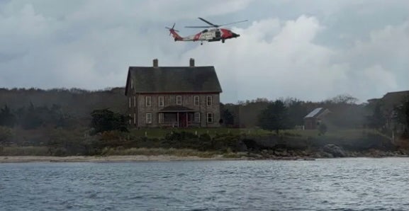 A marine radio that washed up on the remote island led to the family’s rescue