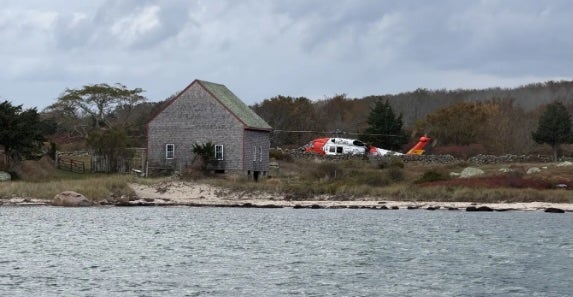 A family was rescued after being stranded on a remote Massachusetts island for a little over a day after their boat caught fire