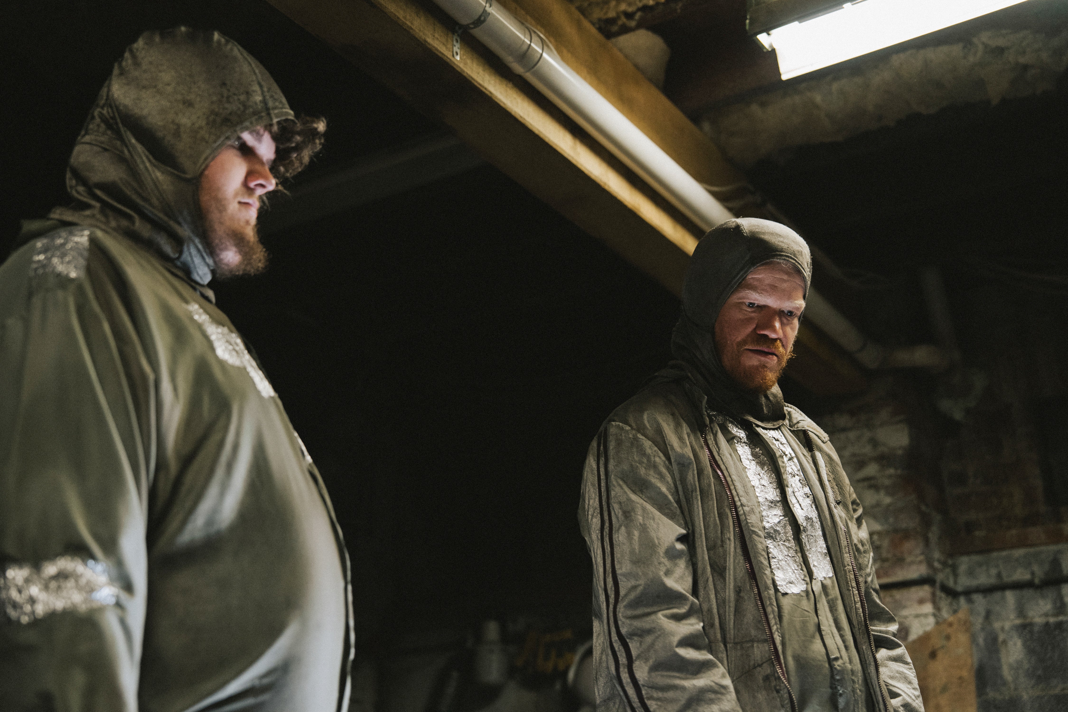 Aidan Delbis and Jesse Plemons in ‘Bugonia’