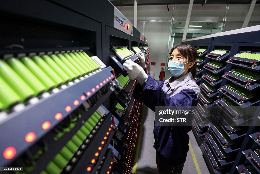 Employee working on a lithium battery production line at a factory in Huaibei