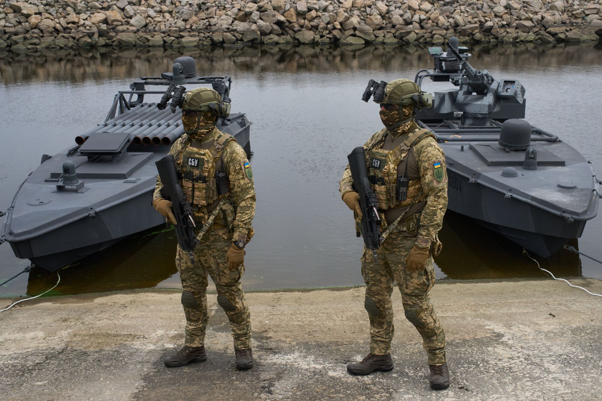 Ukraine's Security Service officers stand by Sea Baby drones, during a demonstration at an undisclosed location in Ukraine Friday, Oct. 17, 2025. (AP Photo/Efrem Lukatsky)
