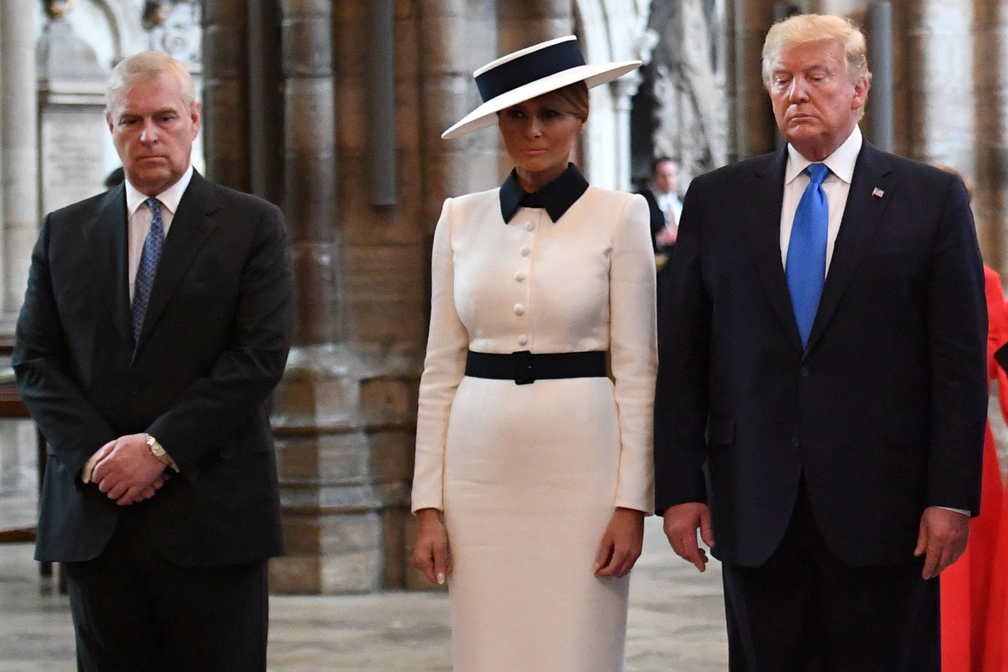 Trump and his wife with Prince Andrew in Westminster Abbey in 2019