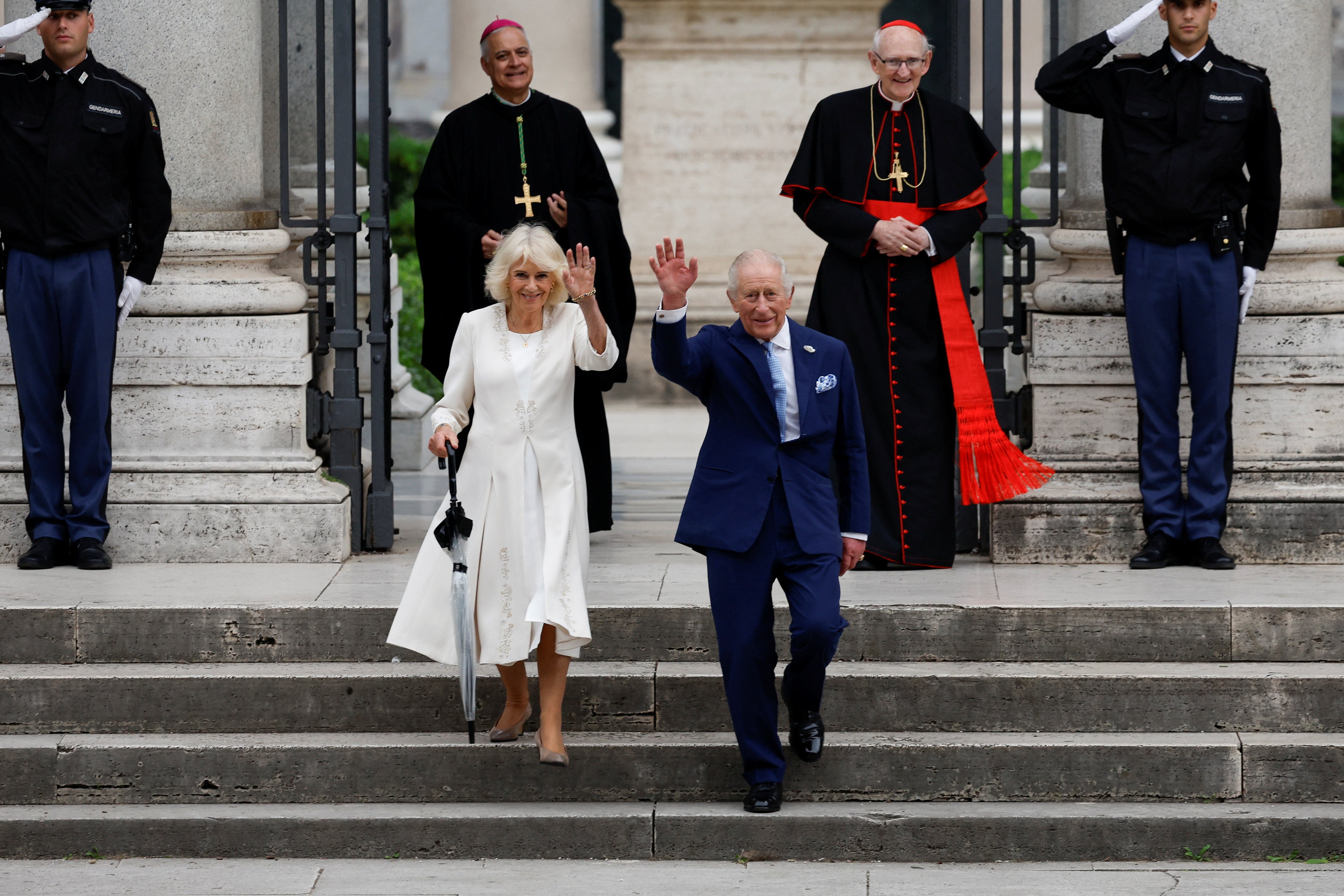 King Charles and Queen Camilla leave following a service at the Basilica of St Paul's Outside the Walls