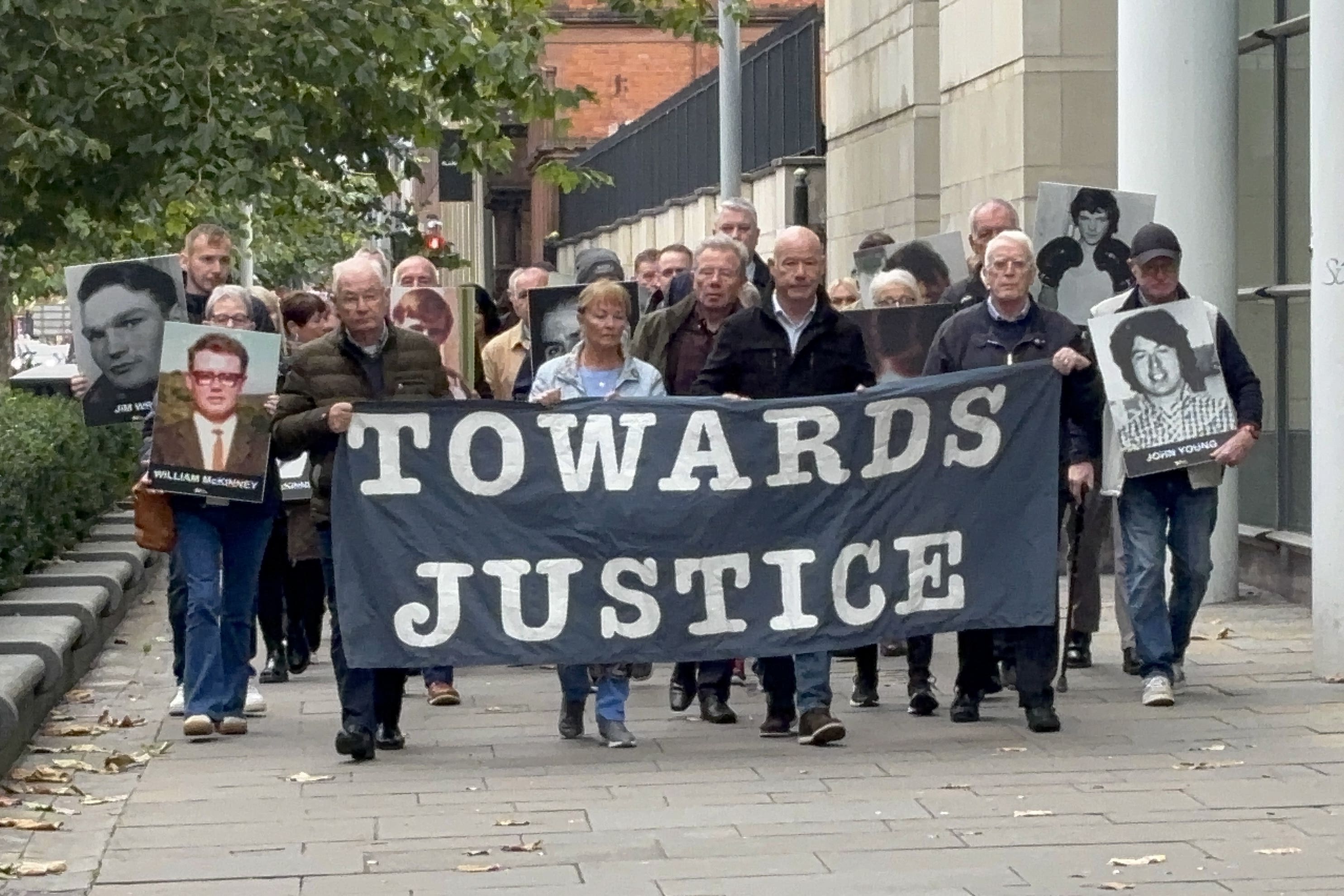 Families of James Wray and William McKinney, who were shot dead during the events of Bloody Sunday, arrive at Belfast Crown Court