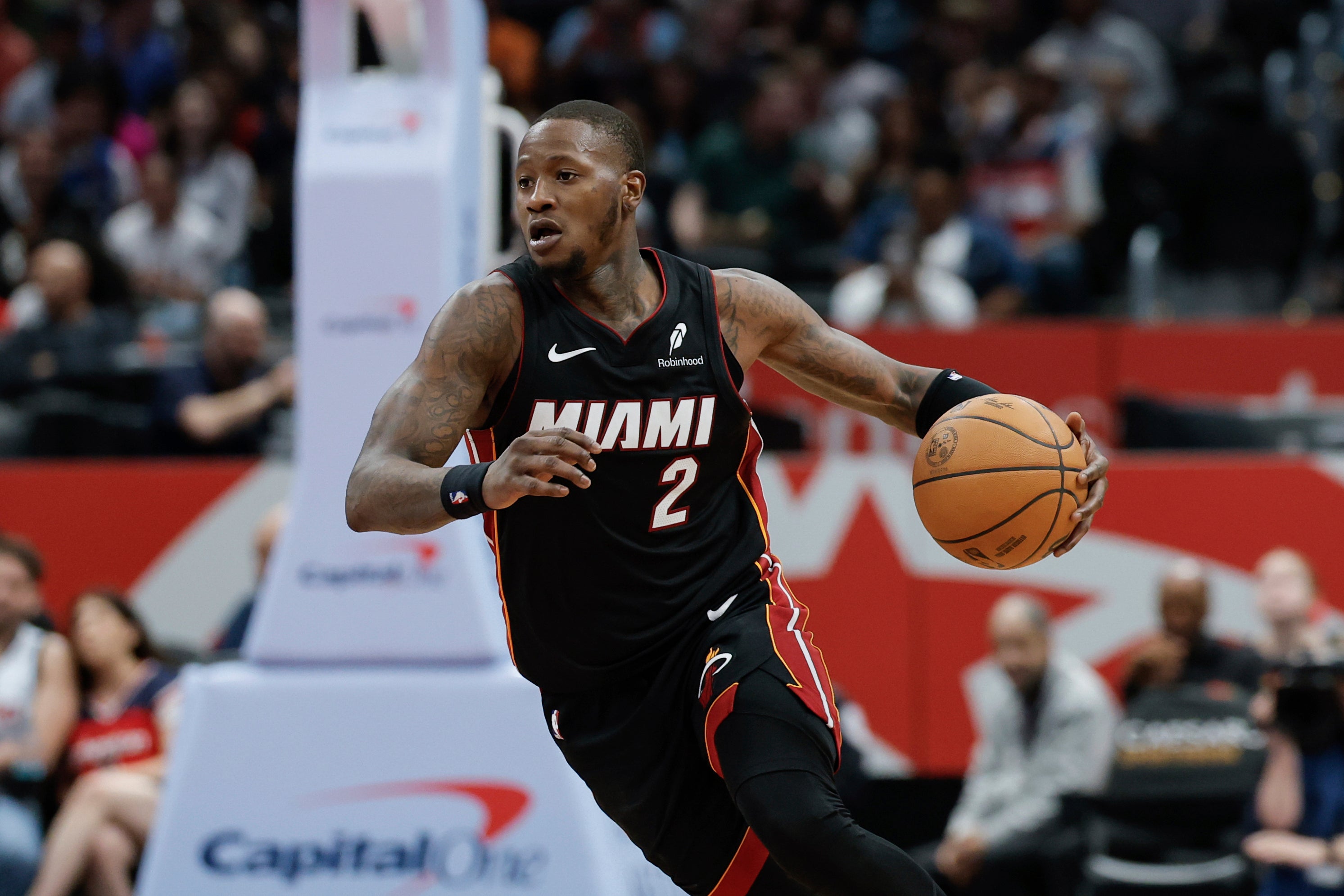 Miami Heat guard Terry Rozier is charged in a separate case alleging a vast sports betting conspiracy