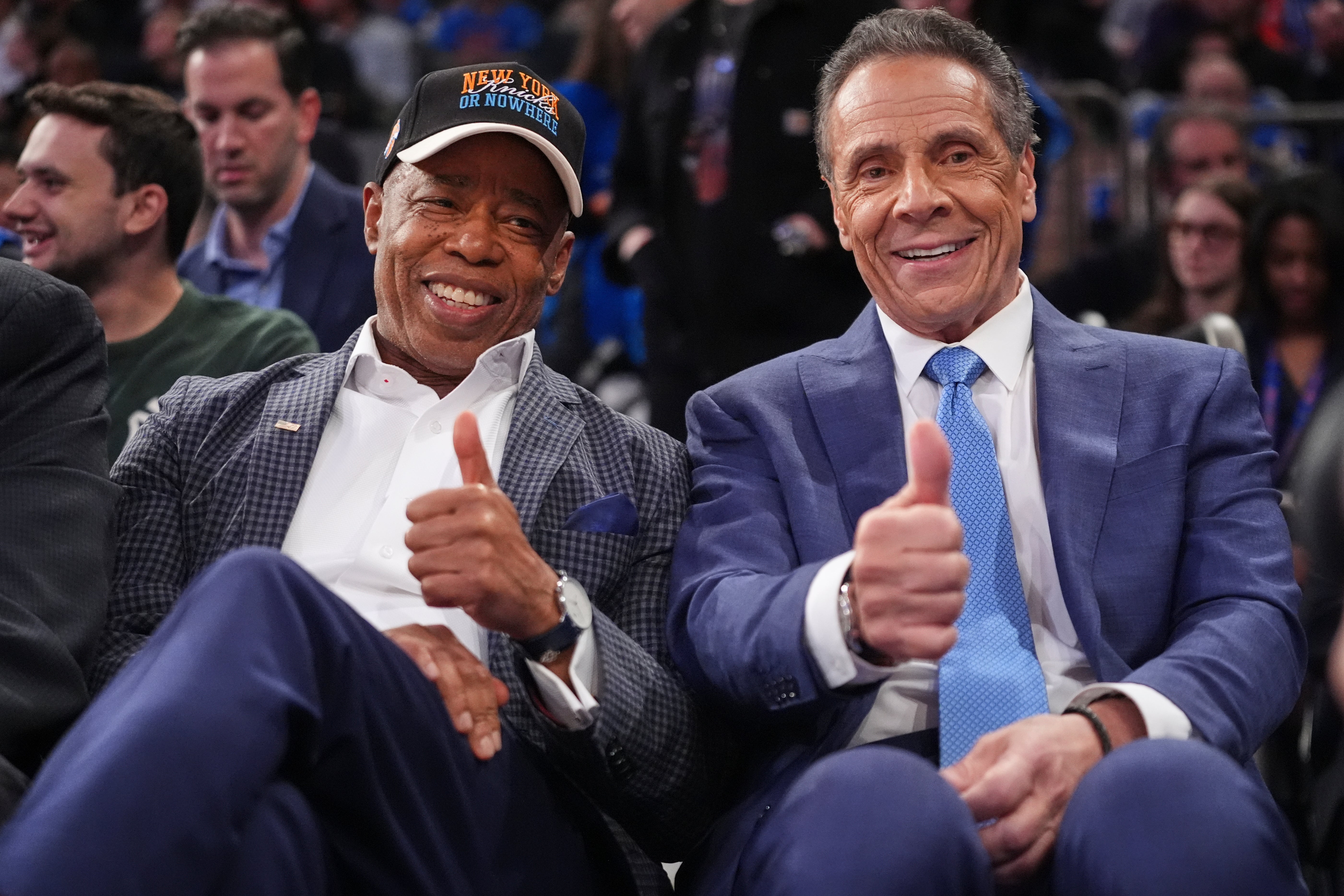 New York City Mayor Eric Adams, left, and Independent candidate former New York governor Andrew Cuomo pose at a New York Knicks game in October, just days before the mayoral election