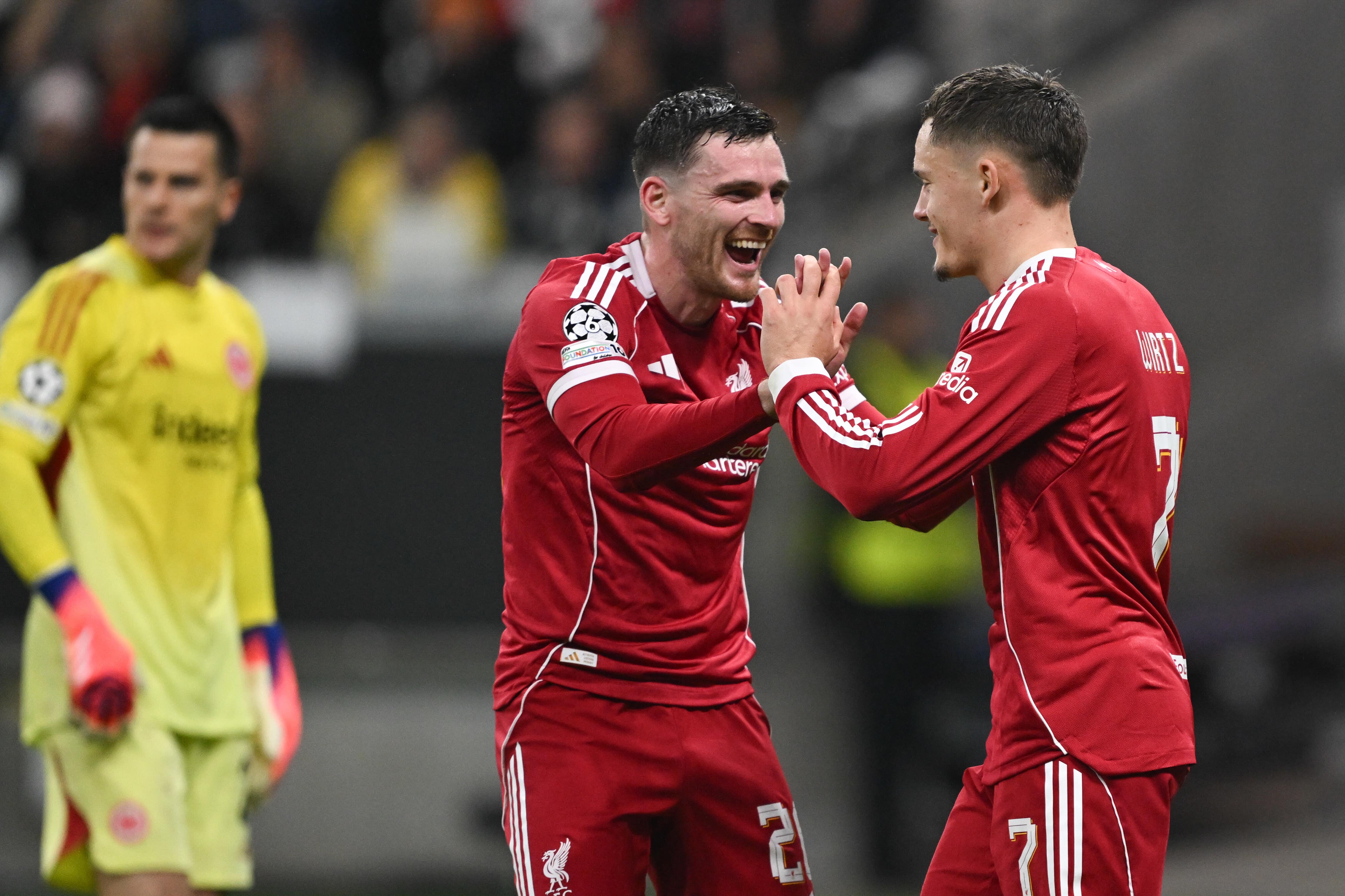 Liverpool’s Andy Robertson, left, celebrates with Florian Wirtz (DPA via Pa Wire)