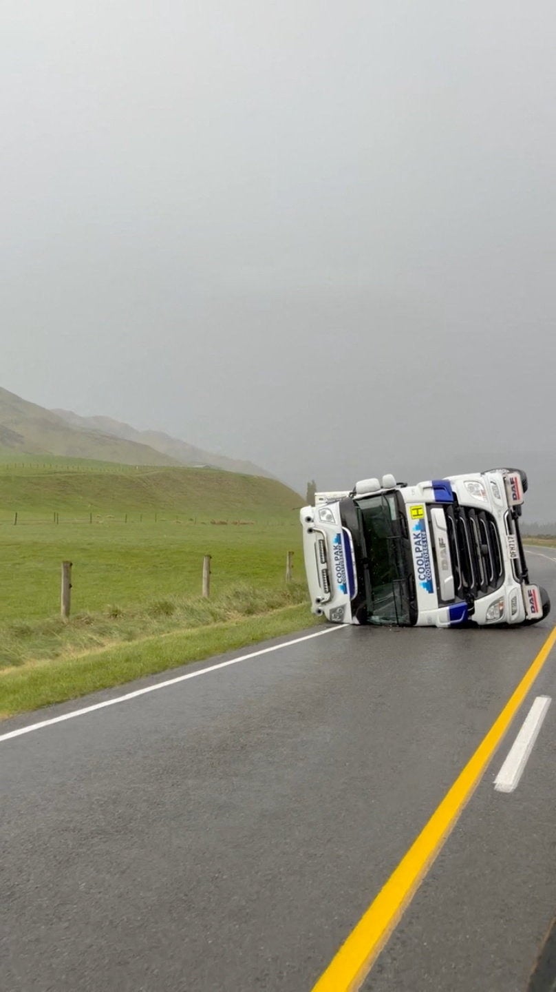 Strong winds overturn a truck on a highway in Springfield