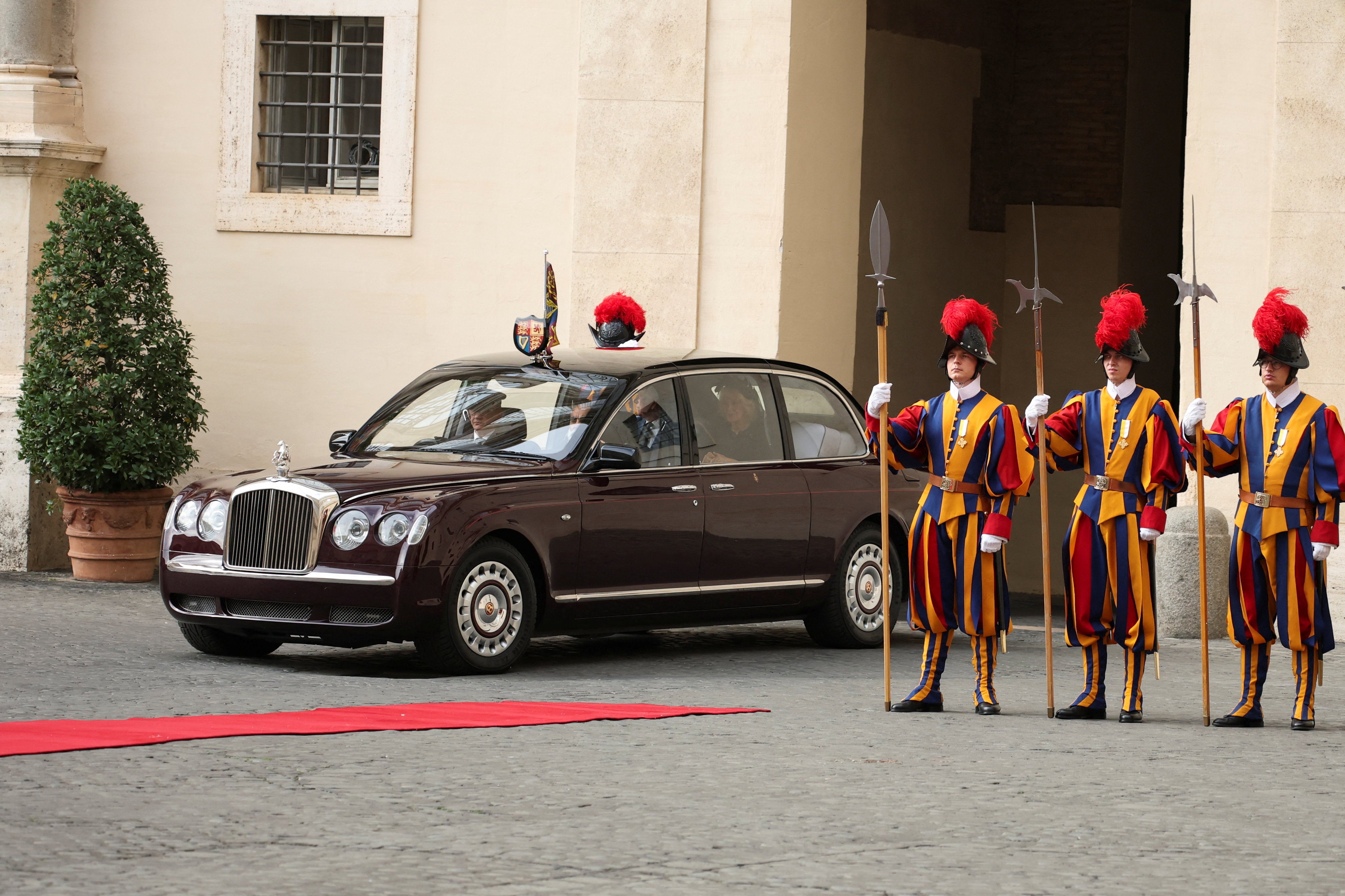 The Vatican's famous Swiss Guard, which has provided protection to the head of the Catholic Church for centuries, was seen waiting outside the Pope's official residence on Thursday morning, before the royal couple arrived.