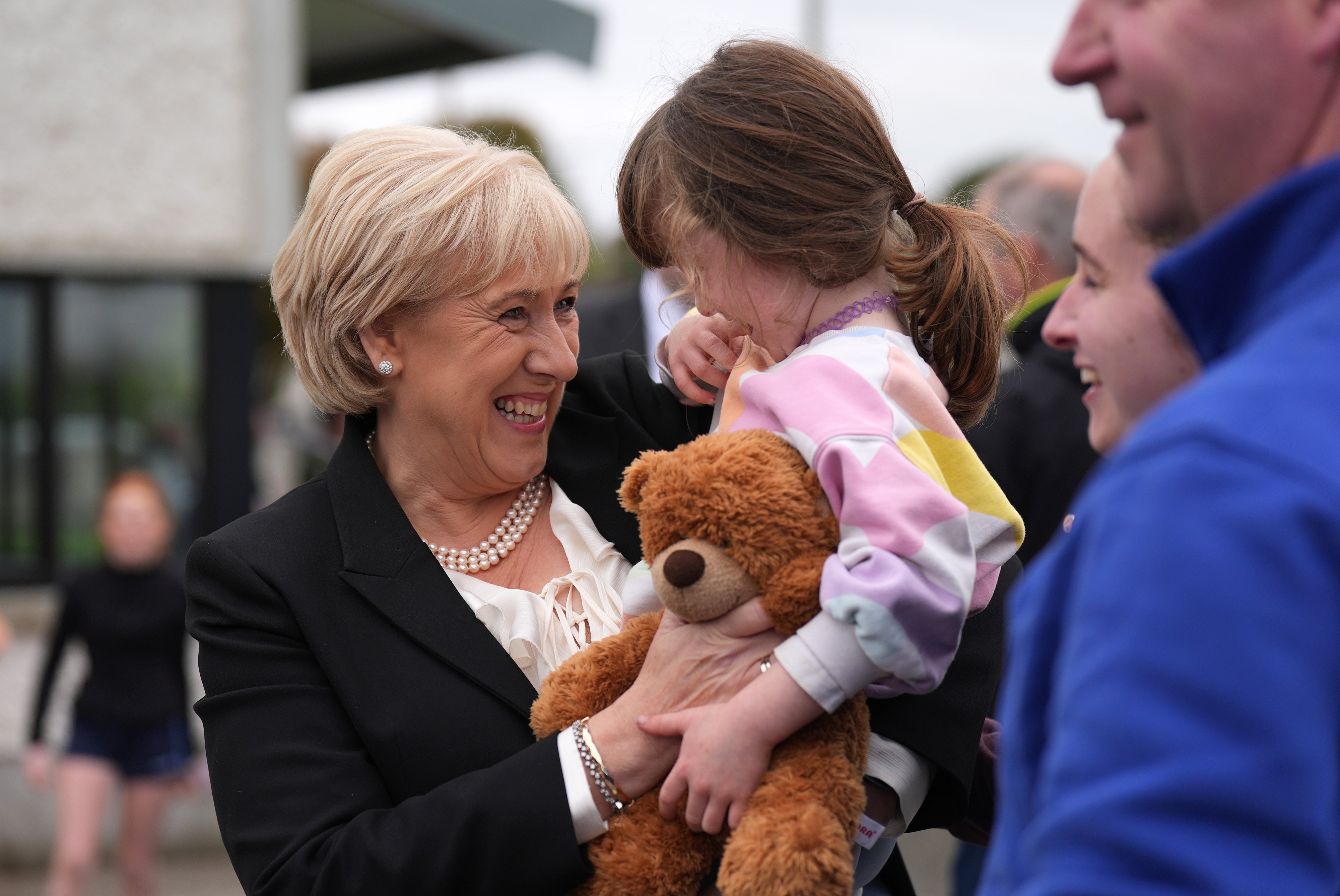 Candidate Heather Humphreys meets Ruth Ryan, four, during a visit to Upperchurch Drombane GAA in Tipperary while on the campaign trail (Niall Carson/PA)