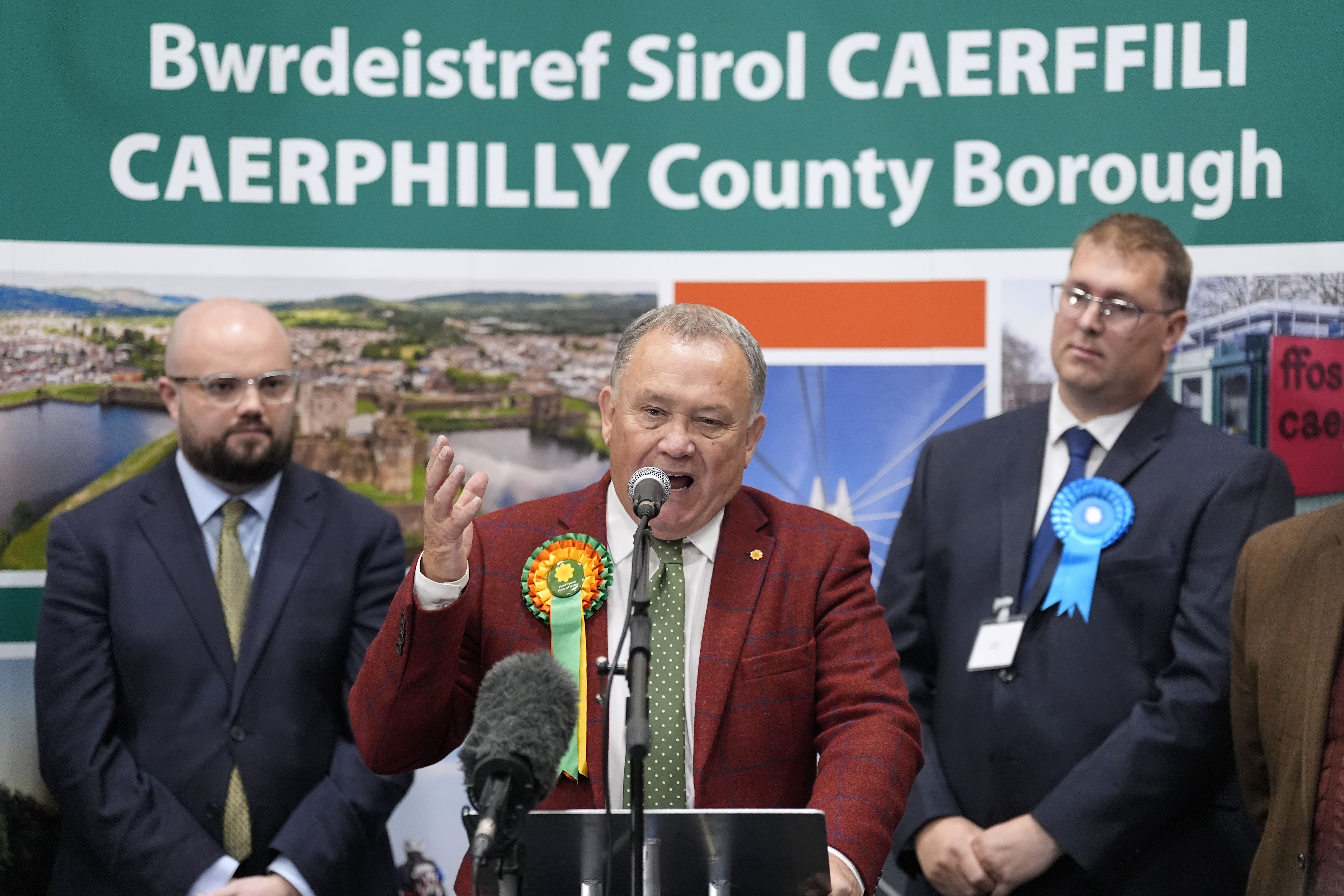Plaid Cymru’s Lindsay Whittle (centre) makes a speech after being declared winner