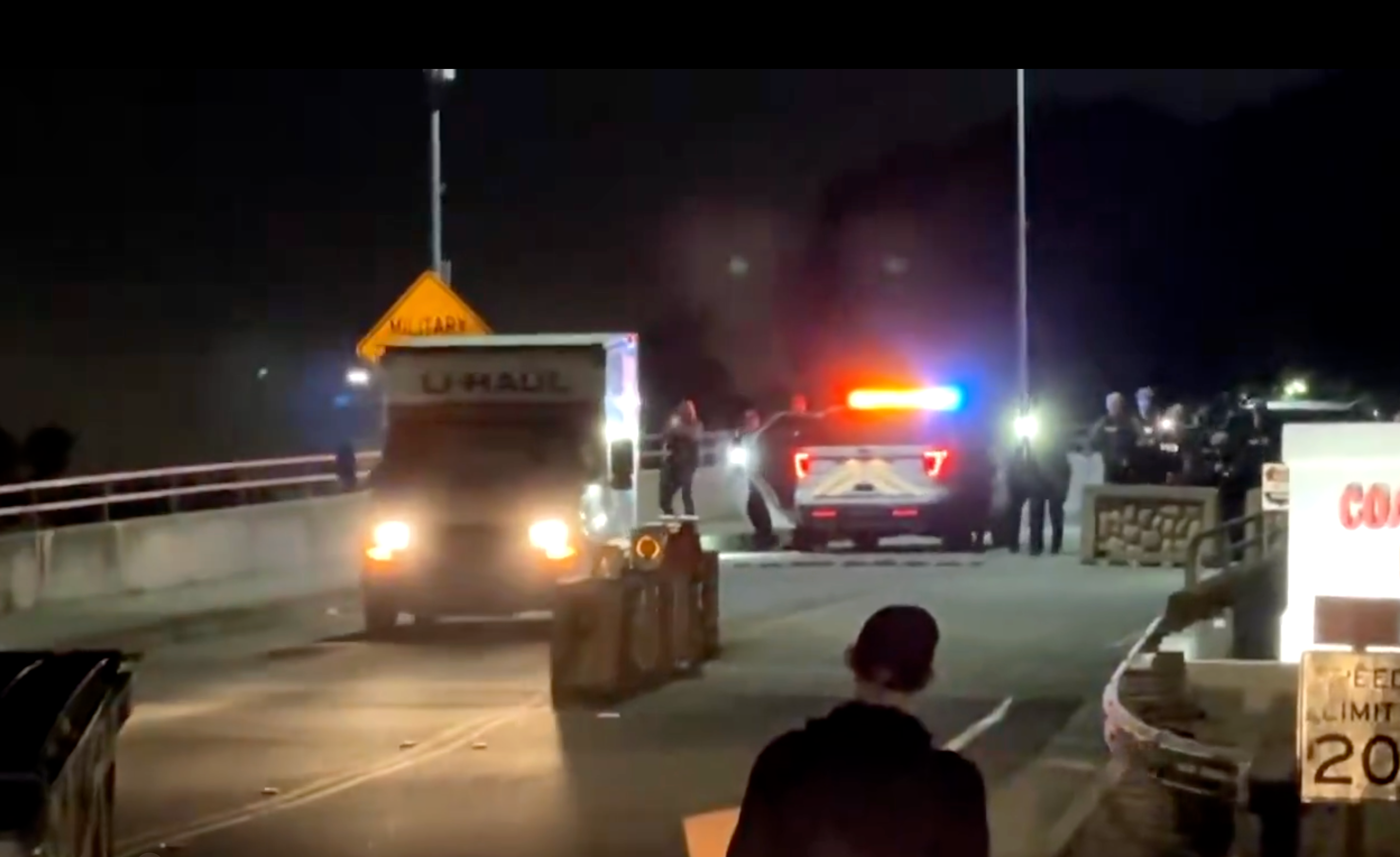 The U-Haul truck seen reversing towards Coast Guard security personnel at Coast Guard Base Alameda in Oakland