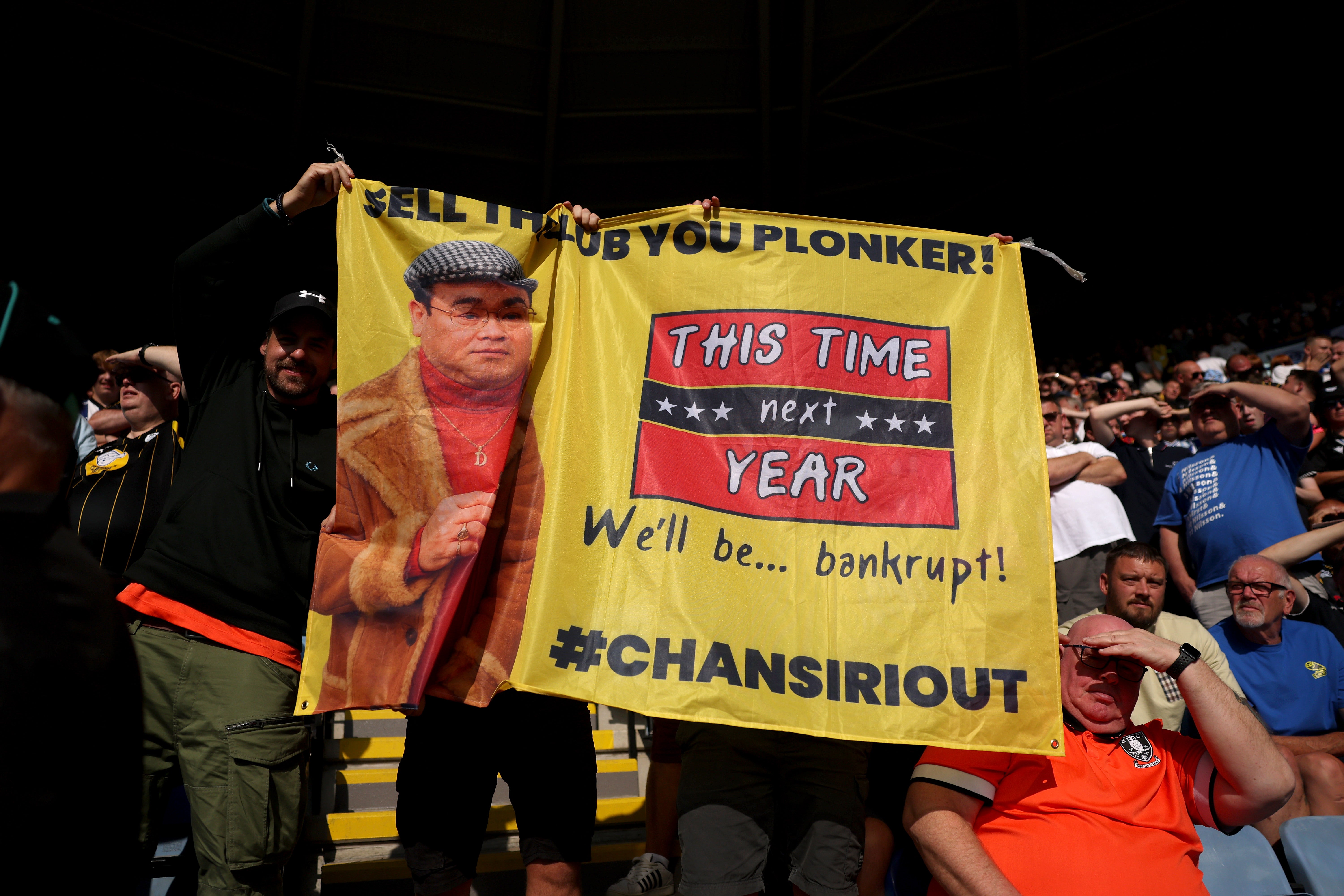 Fans protest against owner Chansiri in the days before his exit