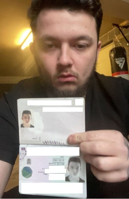 Undated handout photo issued by Metropolitan Police of Dylan Earl holding his passport