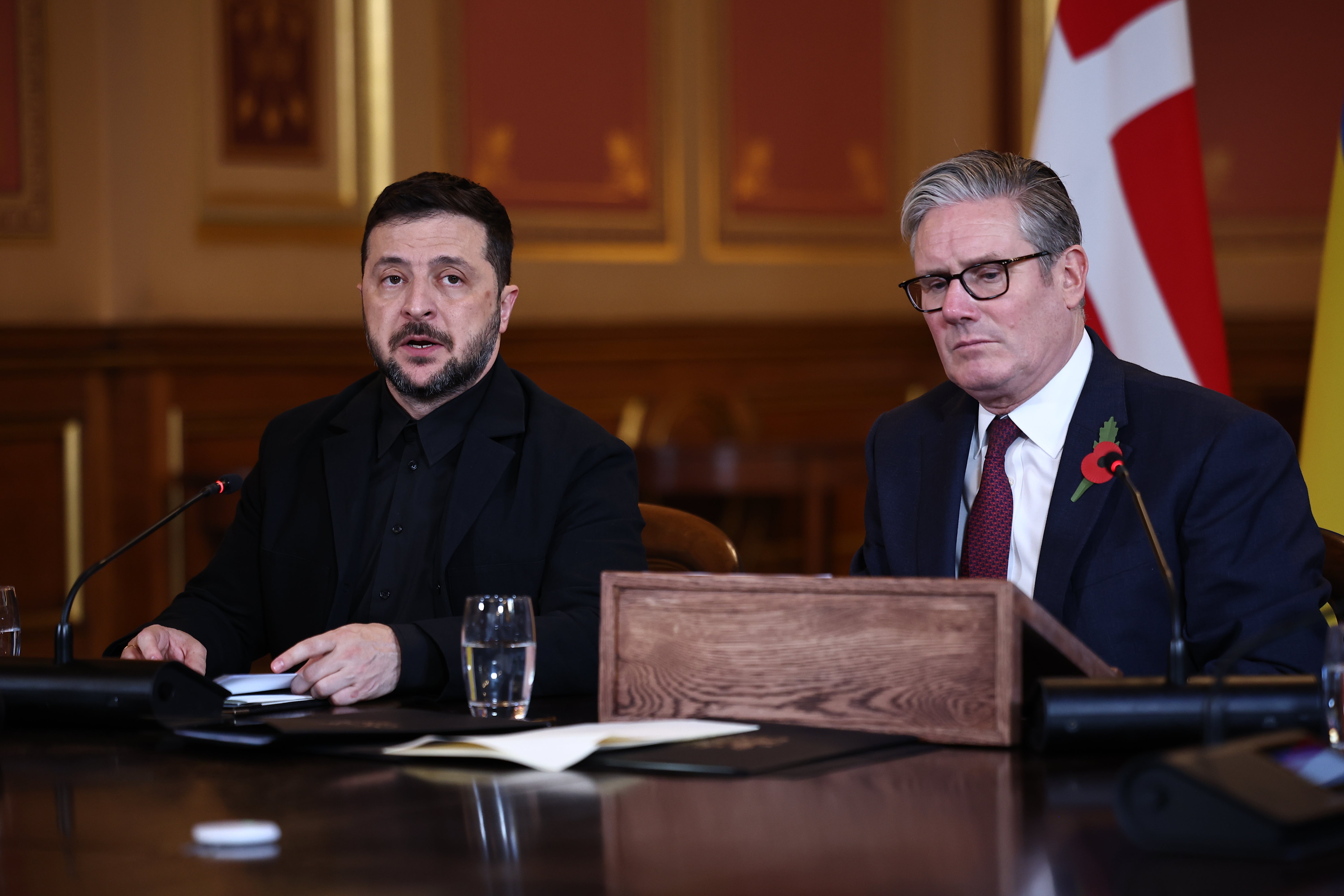 Keir Starmer sits with Ukraine’s President Volodymyr Zelensky during a meeting of ‘coalition of the willing’