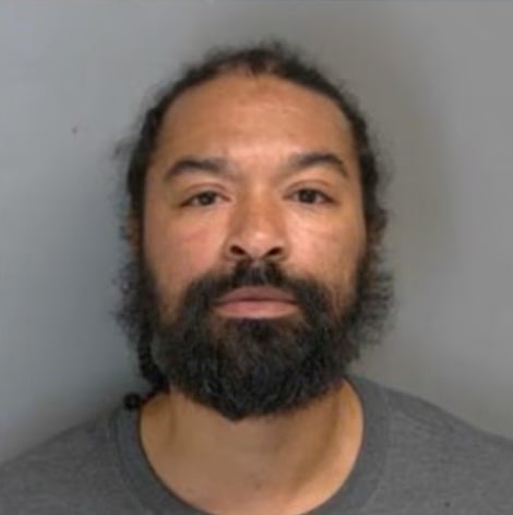 David Scott, Jr., 43, has been charged after threatening to shoot up a Michigan elementary school after his child didn’t get snack time, according to authorities