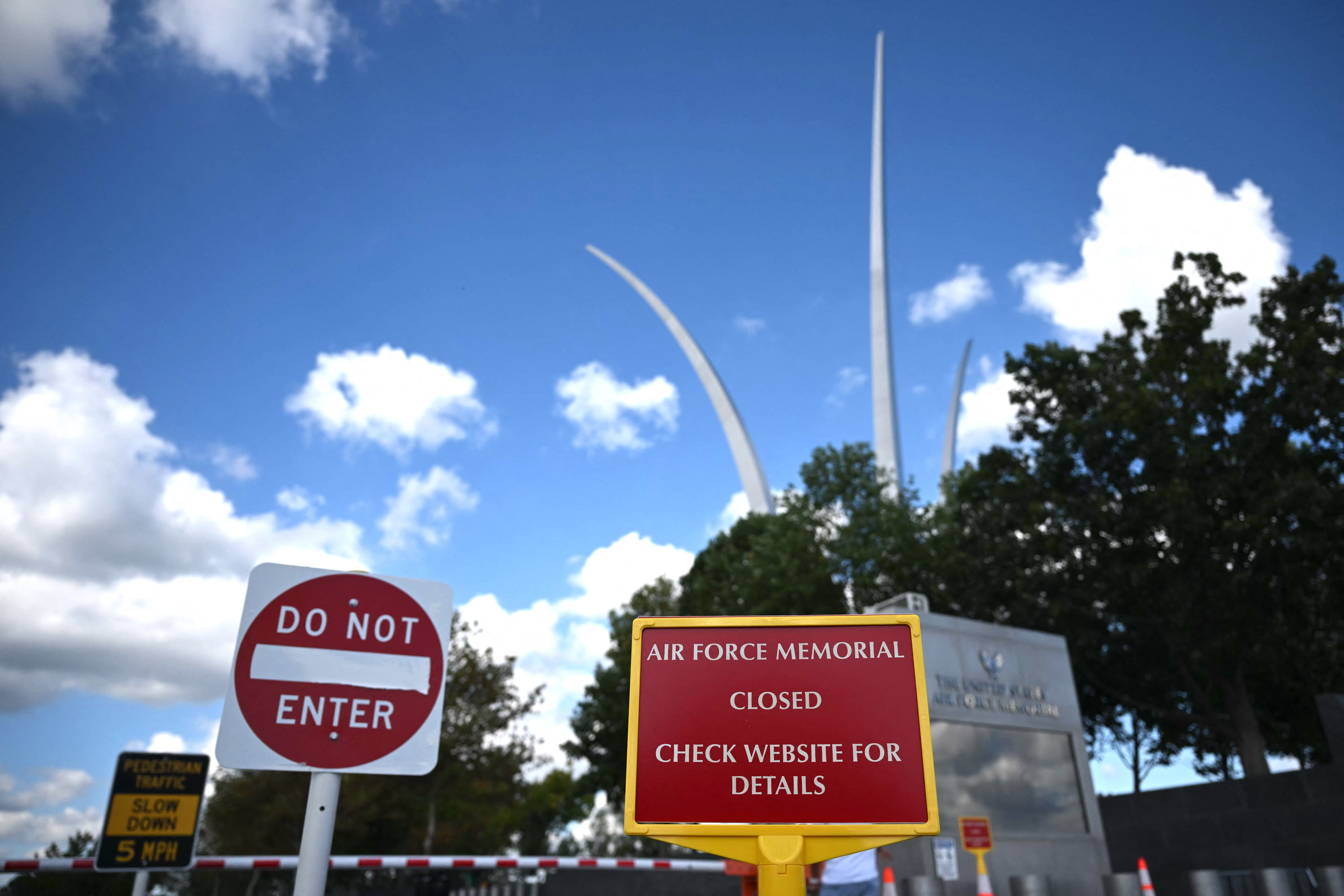 The government shutdown is now the second-longest and has closed monuments and led to some government workers not receiving paychecks.