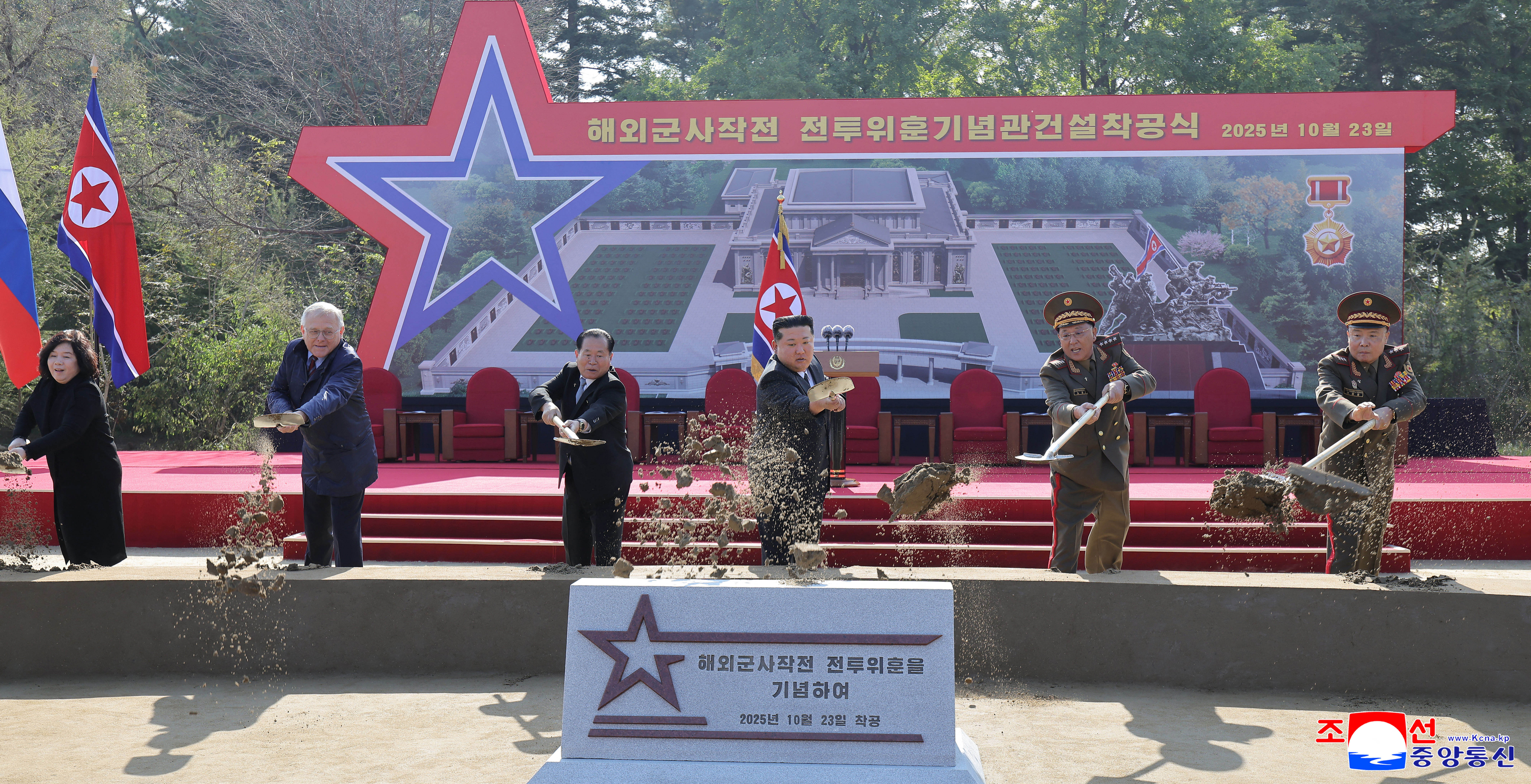 <p>Kim Jong Un and Russian envoy Aleksandr Matsegora use shovels during the groundbreaking ceremony for the Overseas Military Operations Battle Merit Memorial Hall in Pyongyang</p>