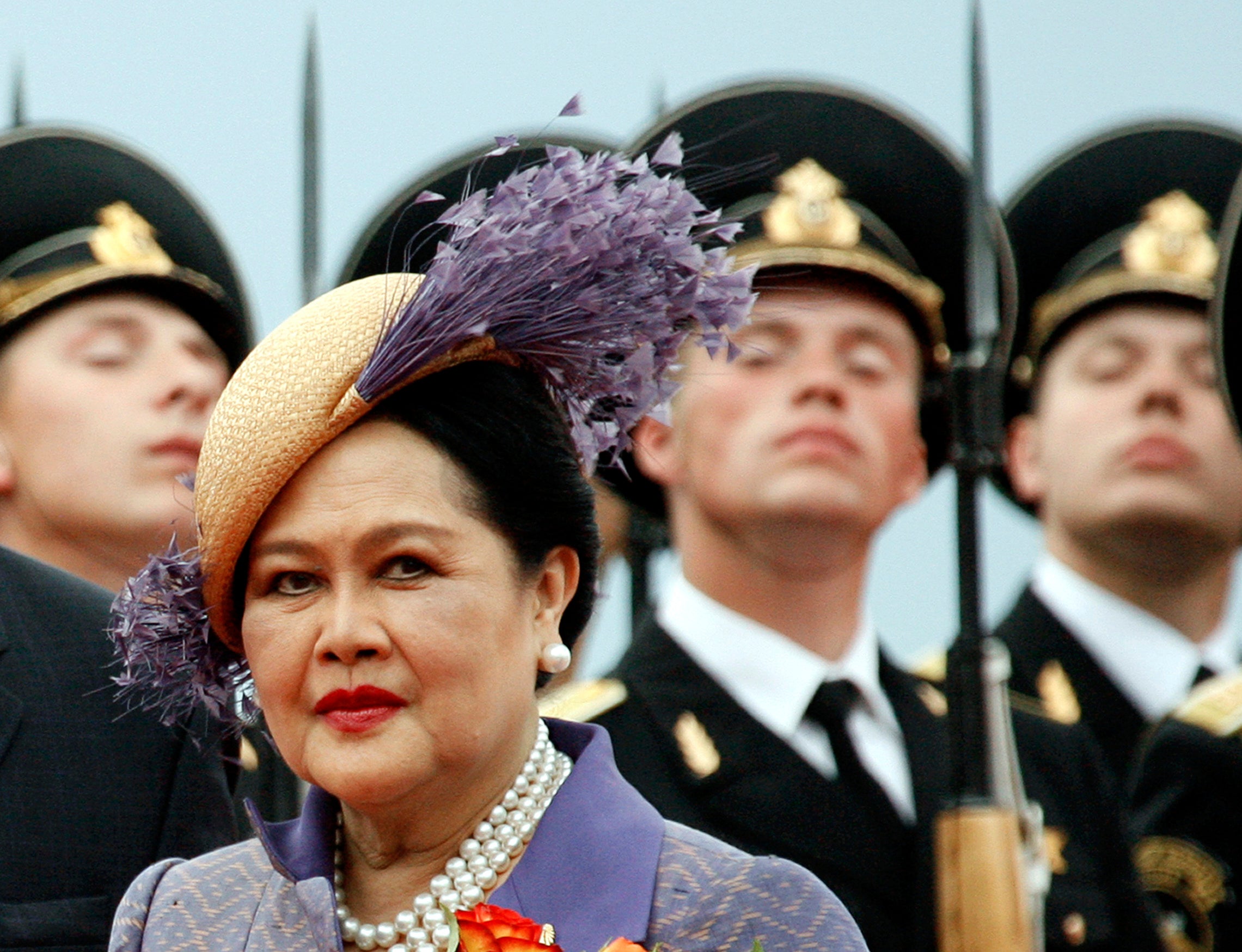 Queen Mother Sirikit passes by Russian honor guards while arriving in Moscow Vnukovo airport, July 2, 2007. (AP Photo/Misha Japaridze, File)