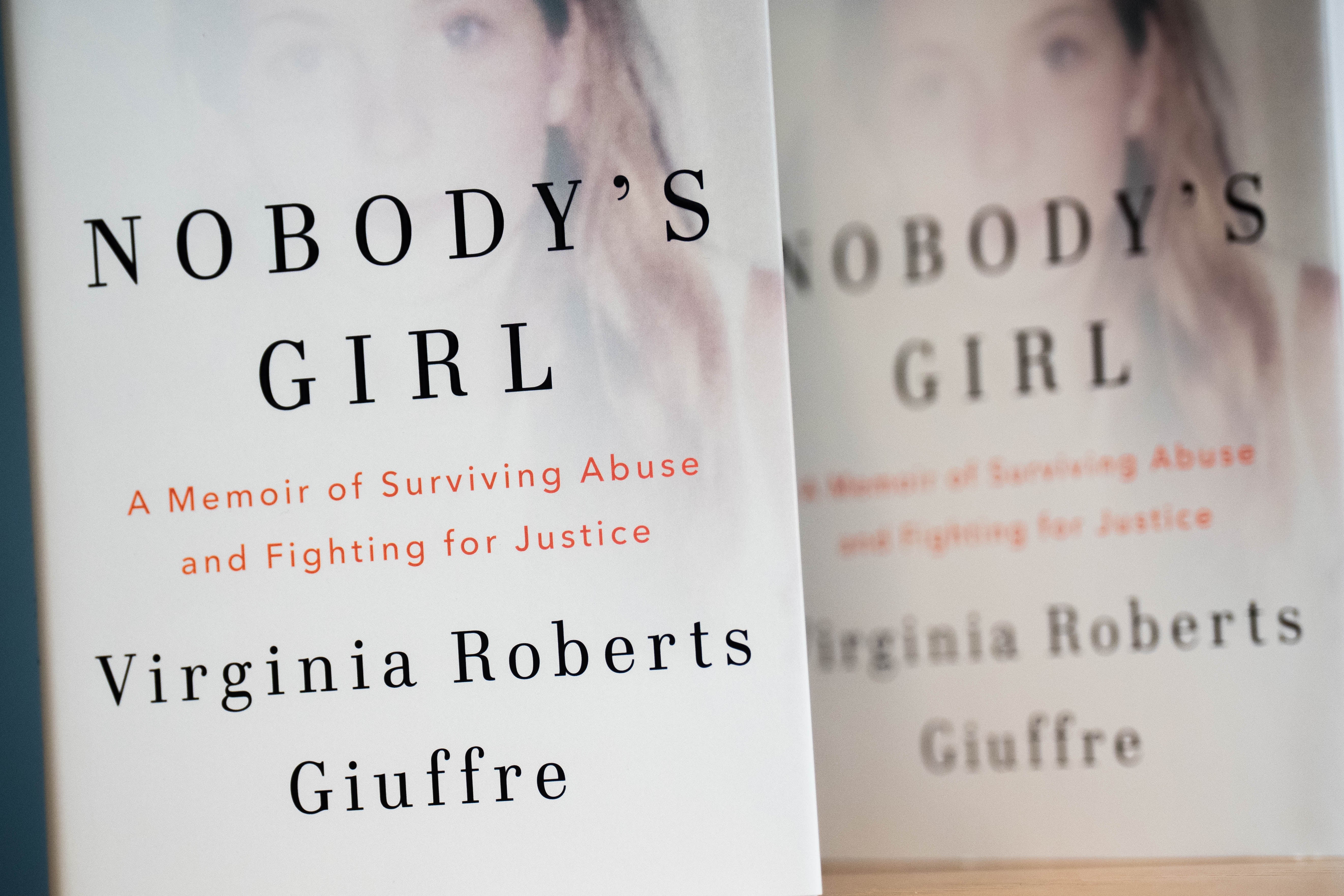 Copies of Nobody’s Girl by Virginia Roberts Giuffre, co-written by Amy Wallace (James Manning/PA)
