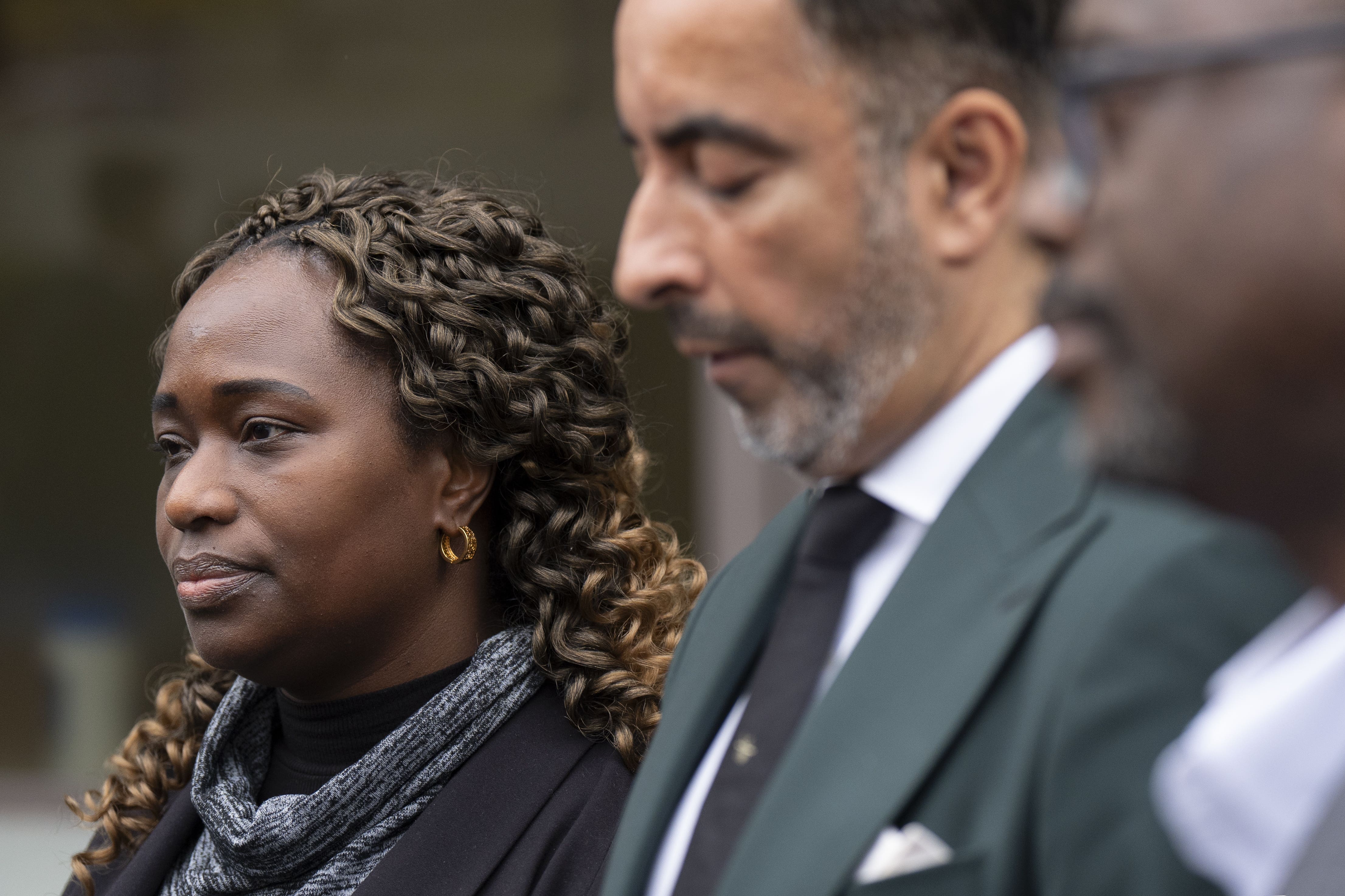 Solicitor Aamer Anwar alongside Sheku Bayoh’s sister Kadi Johnson (left) and brother-in-law Ade Johnson (right) during a press conference outside Capital House, Edinburgh (Jane Barlow/PA)