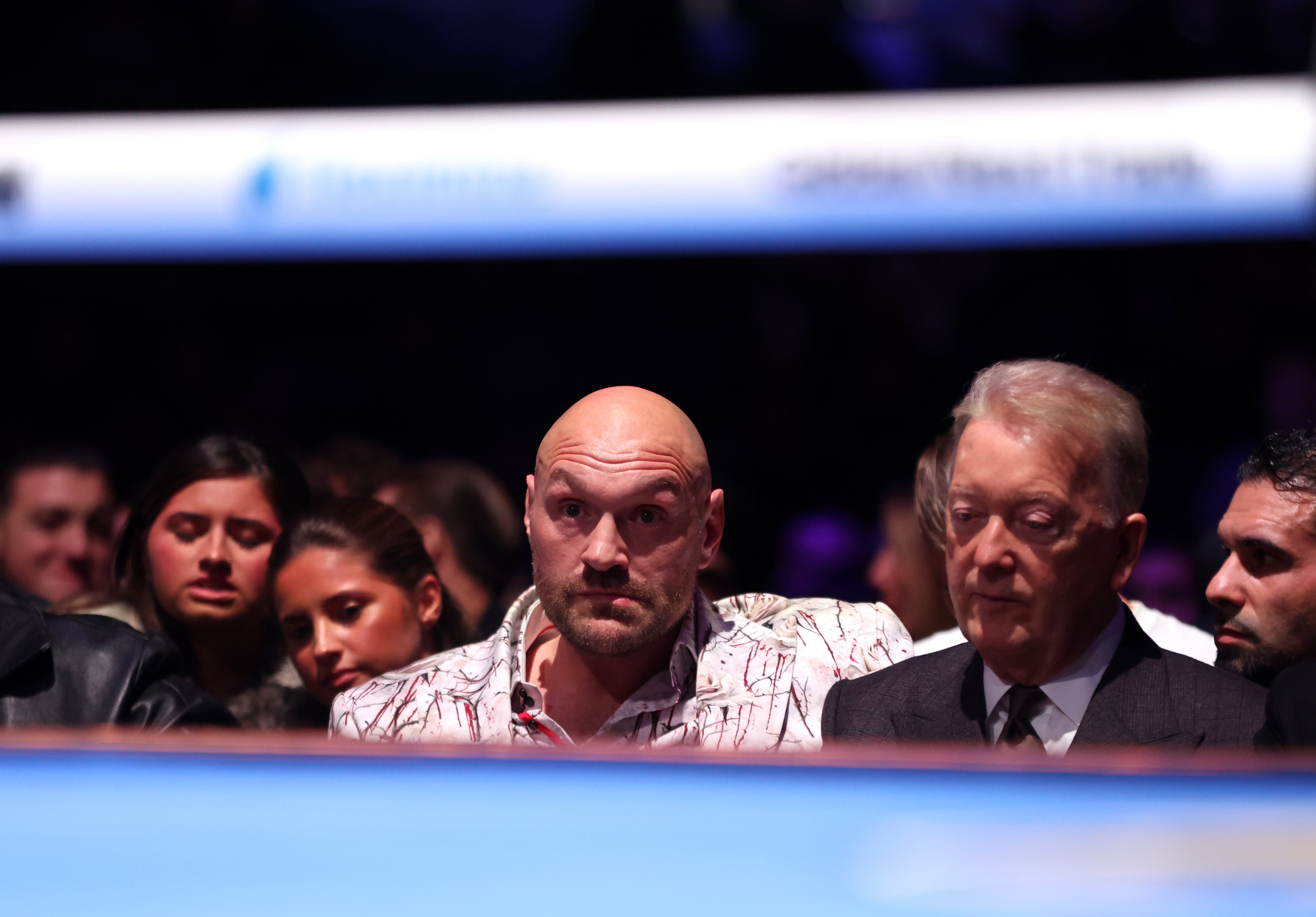 Tyson Fury and Frank Warren in the stands at the O2 arena