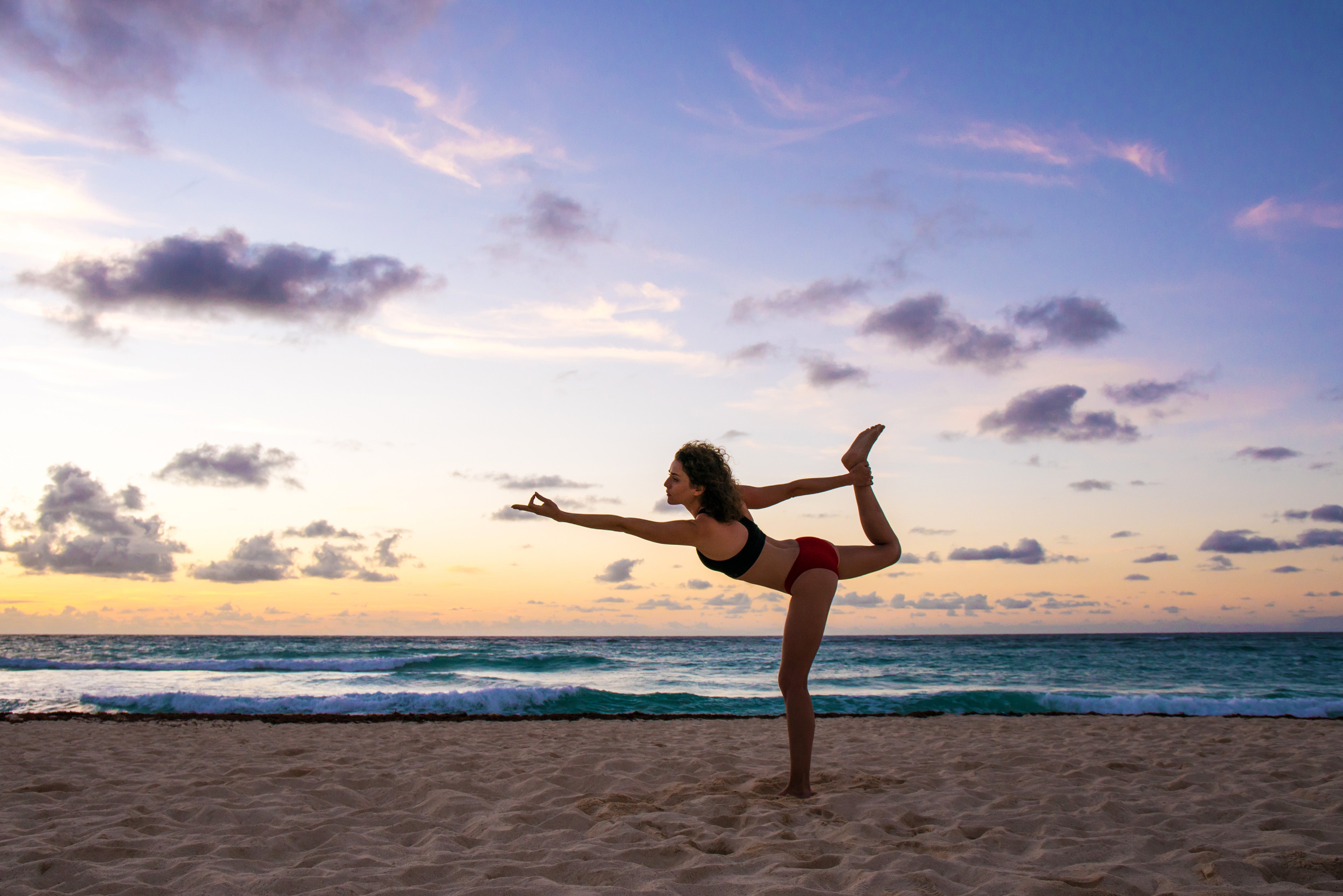 Relax the body with beach yoga at Silver Sands