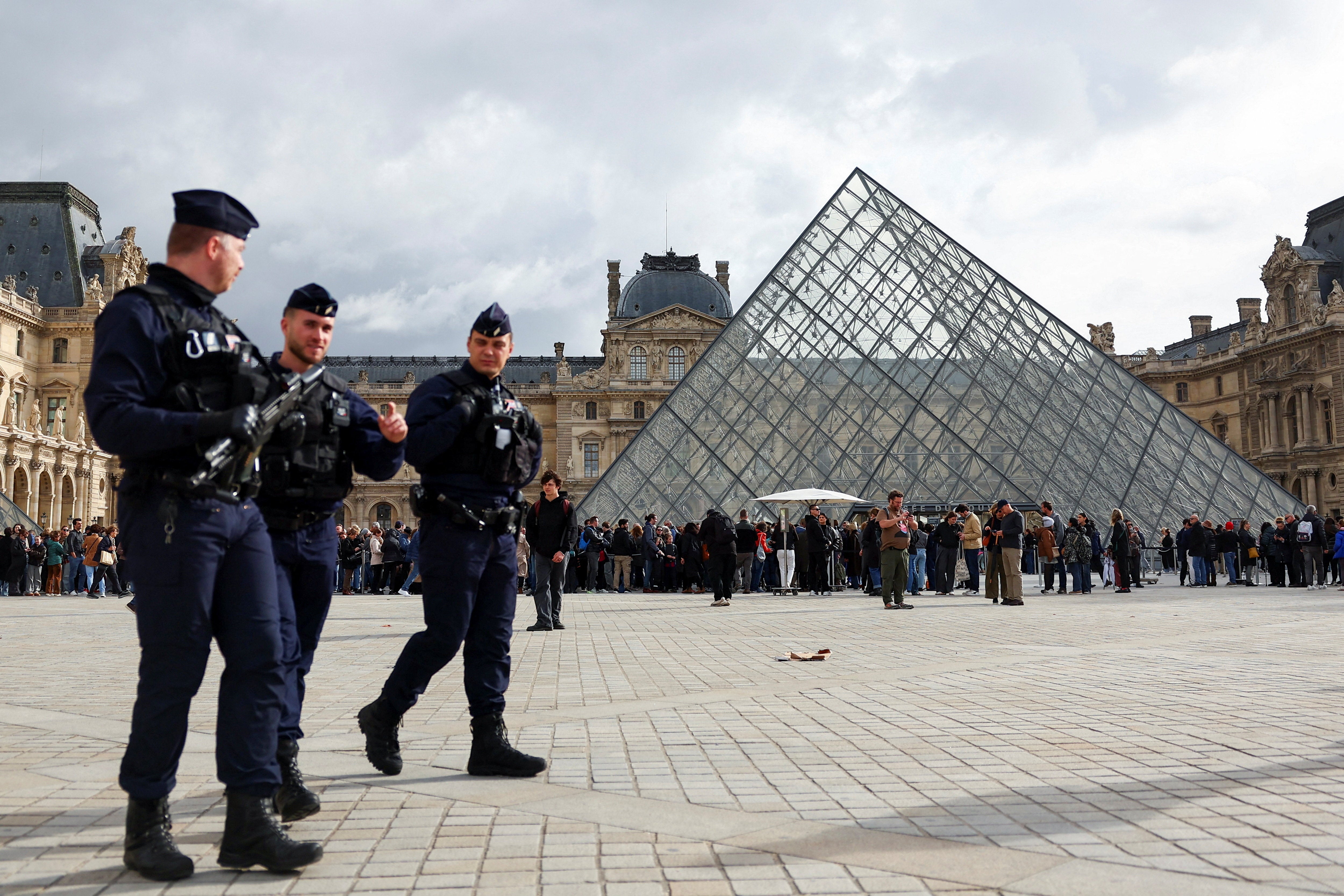 Police outside the museum after thieves stole jewels worth tens of millions