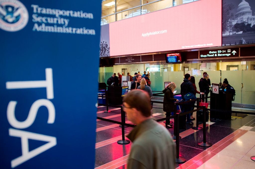 Passengers at Washington's DCA Reagan National airport, where shutdown-related delays were reported over the weekend.